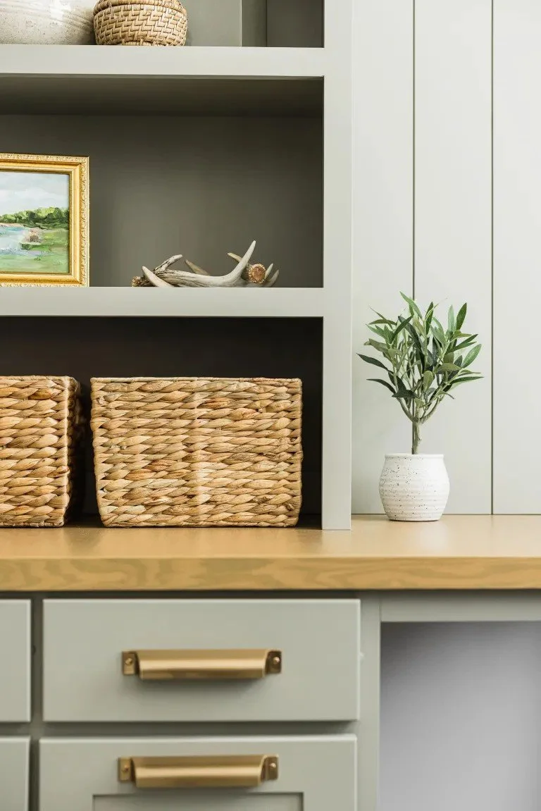 Orchard Park, NY - Interior design & Custom Cabinetry - Office Remodel: If you’ve ever worked from home, you want an office remodel like! With two workstations, decorative open shelving, thoughtful organization, and intentional design, this office ha