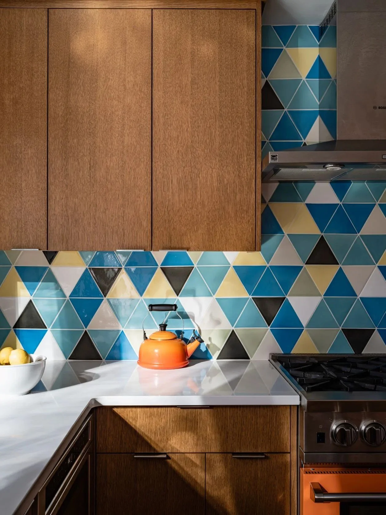 A colorful Snyder home designed for a fresh chapter, blending Craftsman-inspired warmth, natural wood, expressive tile, music, pop art, and collected furnishings into a space that feels joyful and entirely personal.