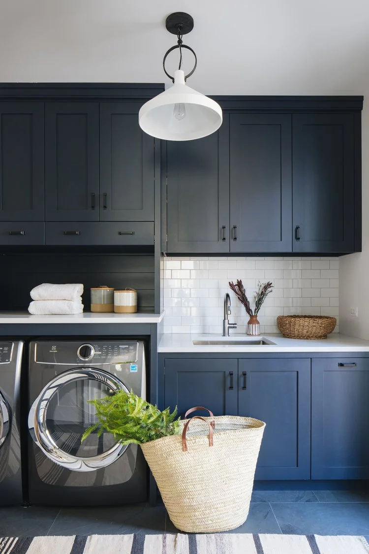 The result is a kitchen that perfectly balances simple, modern lines with classic Craftsman charm. Warm wood tones and deep green accents bring richness and character, creating a space that feels both grounded and inviting.