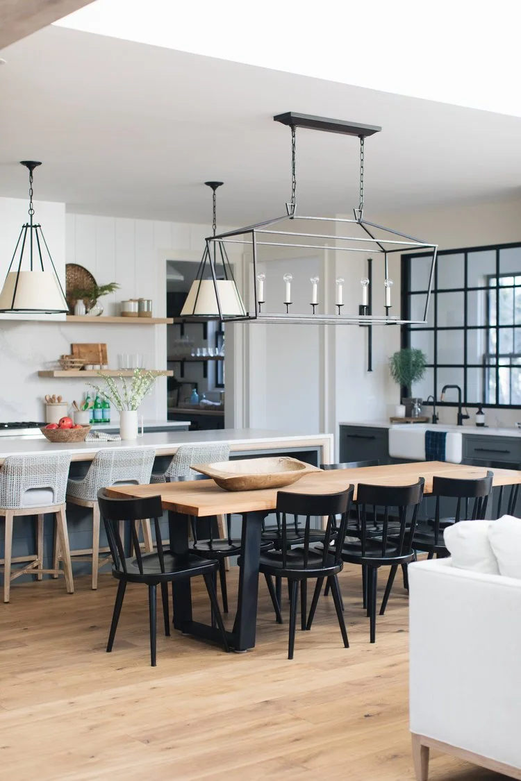 The result is a kitchen that perfectly balances simple, modern lines with classic Craftsman charm. Warm wood tones and deep green accents bring richness and character, creating a space that feels both grounded and inviting.