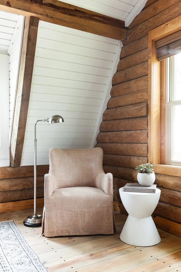 This custom attic renovation in East Aurora, NY transformed an underutilized upper level into a warm, functional, and thoughtfully designed bedroom retreat complete with a private en suite bathroom.