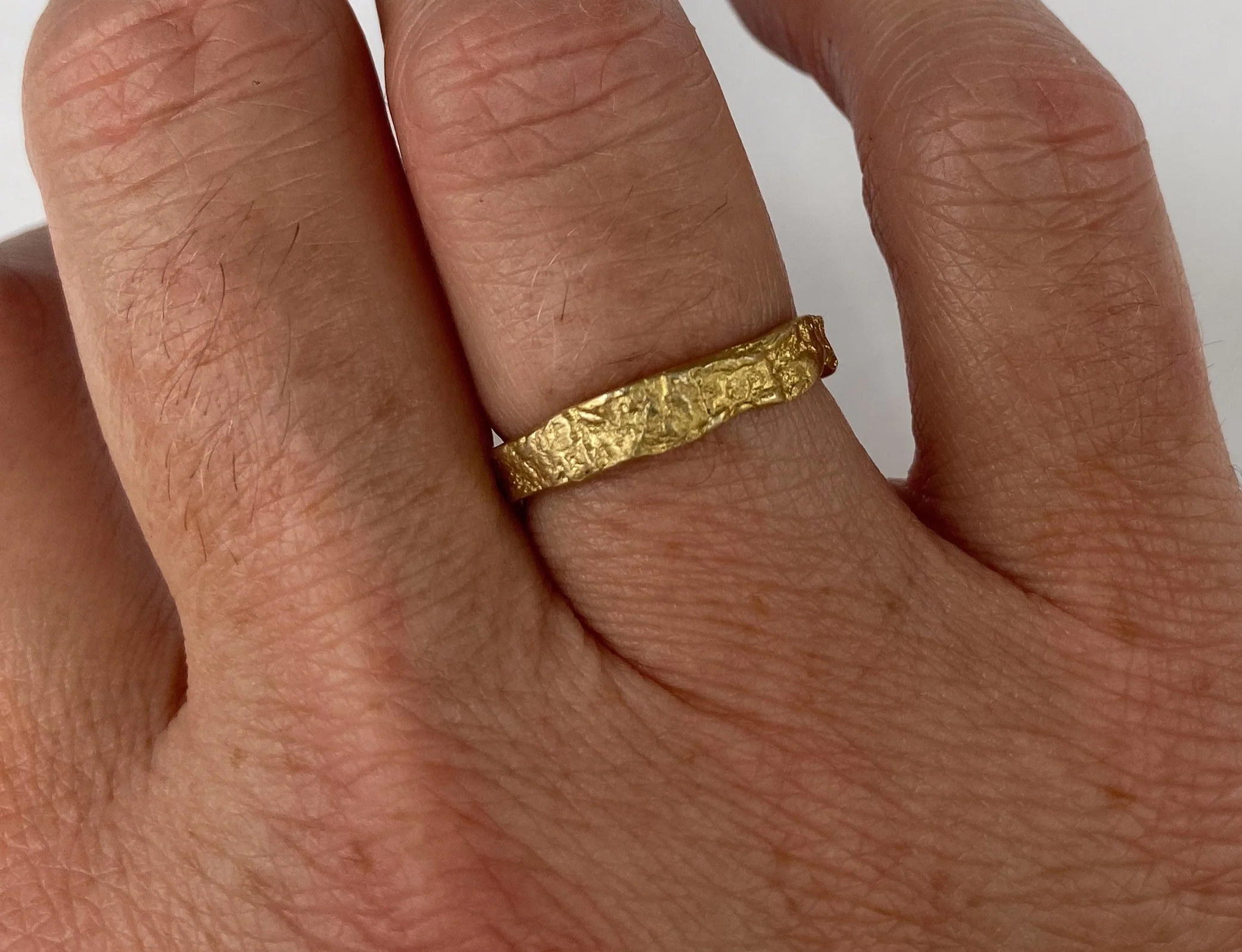 Rockface Ring On Hand.jpg