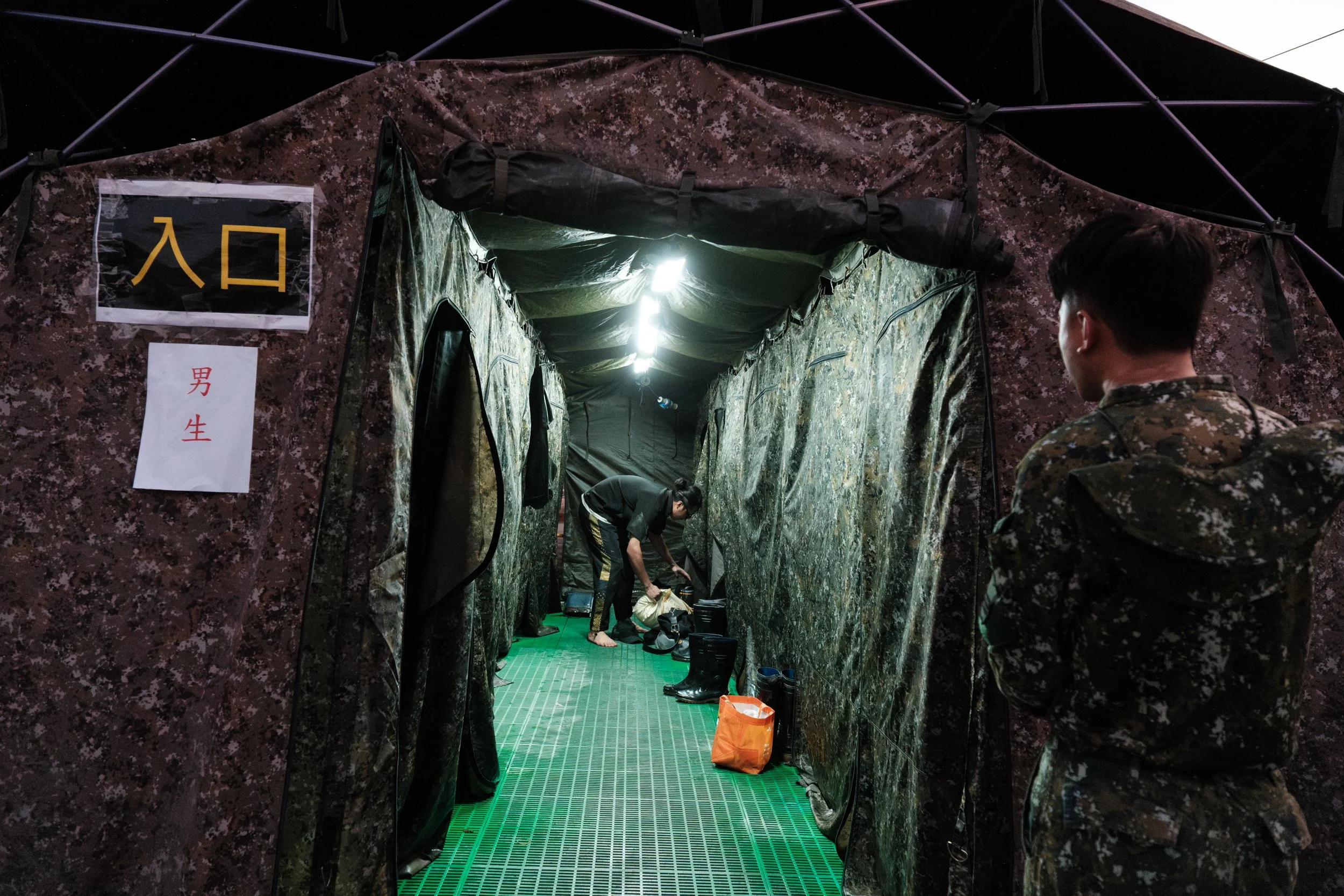 Mobile military showers are set up outside Guangfu Train Station in Hualien.