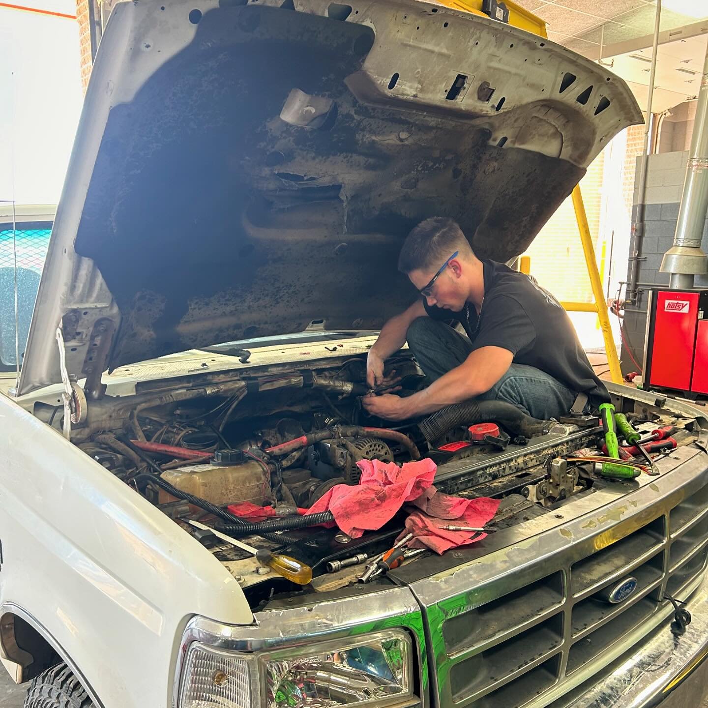 Jaxon Wilson, a Junior at Woodward High School, is seen here changing 8 injectors and an under valve cover harness in the HPTC Diesel shop. Jesse Palacios, one of Jaxon&rsquo;s instructors, captured this photo at 4:15, well after Jaxon&rsquo;s class 