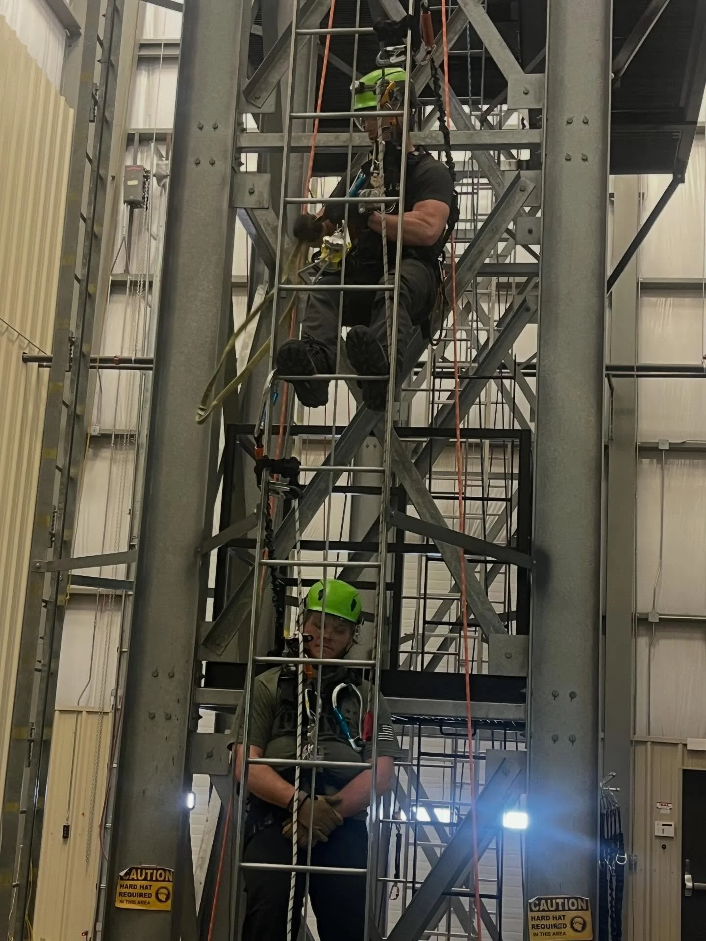 Zeke Holford demonstrates a rescue technique alongside new instructor Nathan Pitts.