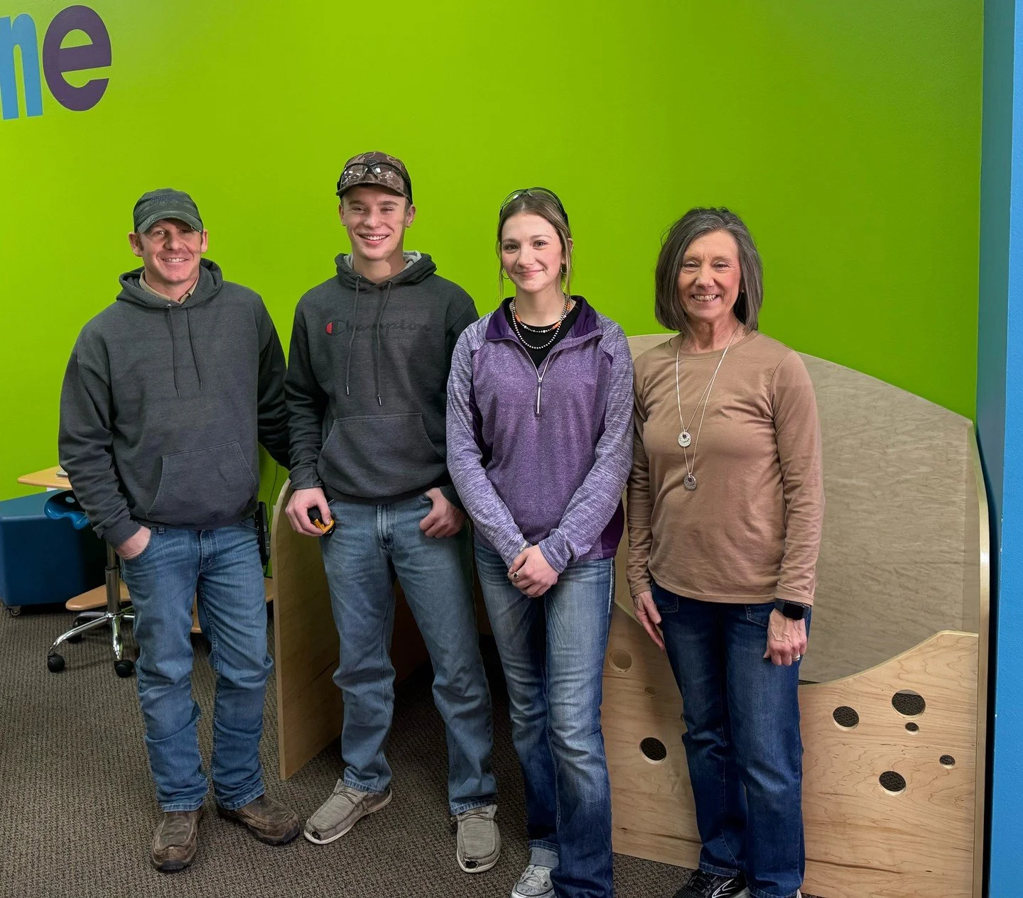 HPTC Construction students built this family workstation for the Woodward Public Library. Caleb Jones and Haylee Clyden led the project and completed the majority of the work, with the installation taking place today. Pictured with them is Connie Ter