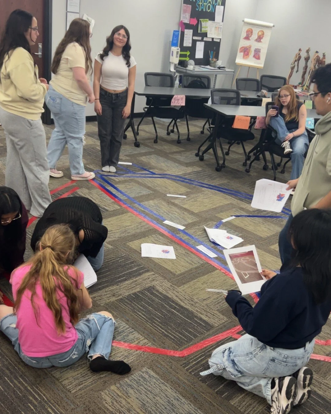 Hands-on learning in action 🫀 Our Health Careers students in Woodward are building a heart on the floor to learn and visualize blood flow through the heart.