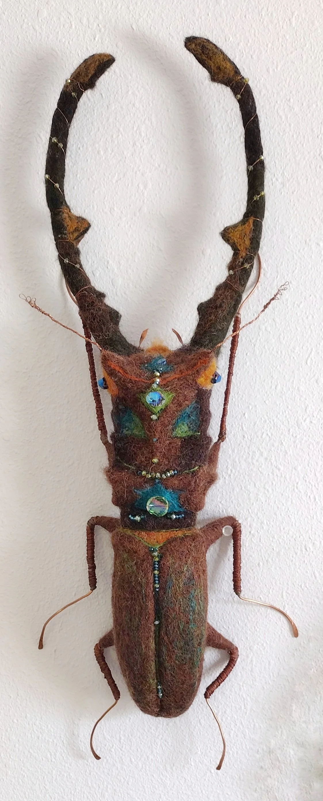 Coleoptera Lucanide, Stag Beetle, (Sr. Walter Lucanus), Merino and Corriedale wool, Bamboo silk over recycled copper armature, Swarovski and glass beads, 18" x 9"