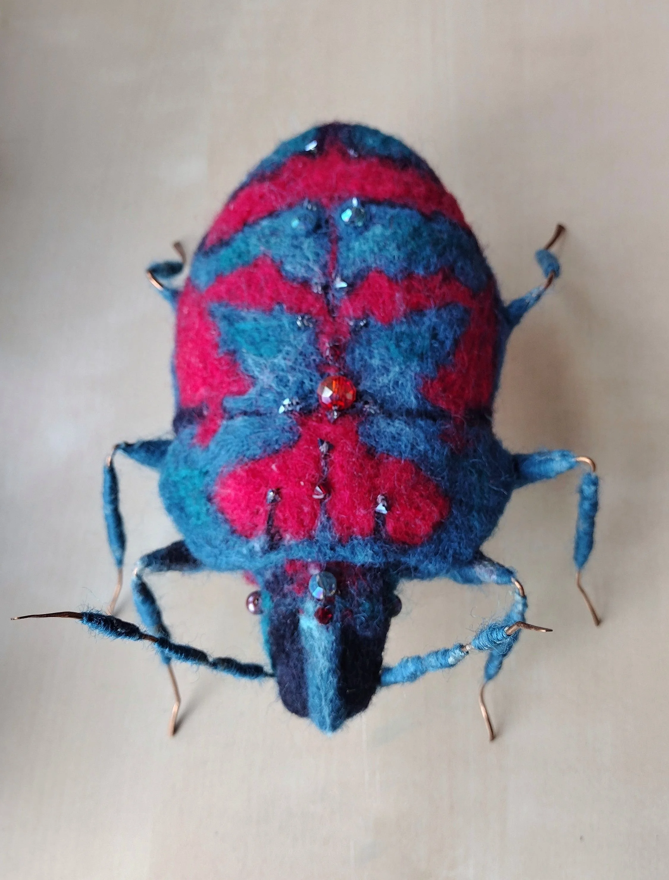 Hibiscus Harlequin, Merino and Corriedale wool, Bamboo silk over recycled copper armature, Swarovski and glass beads, 5" x 7"