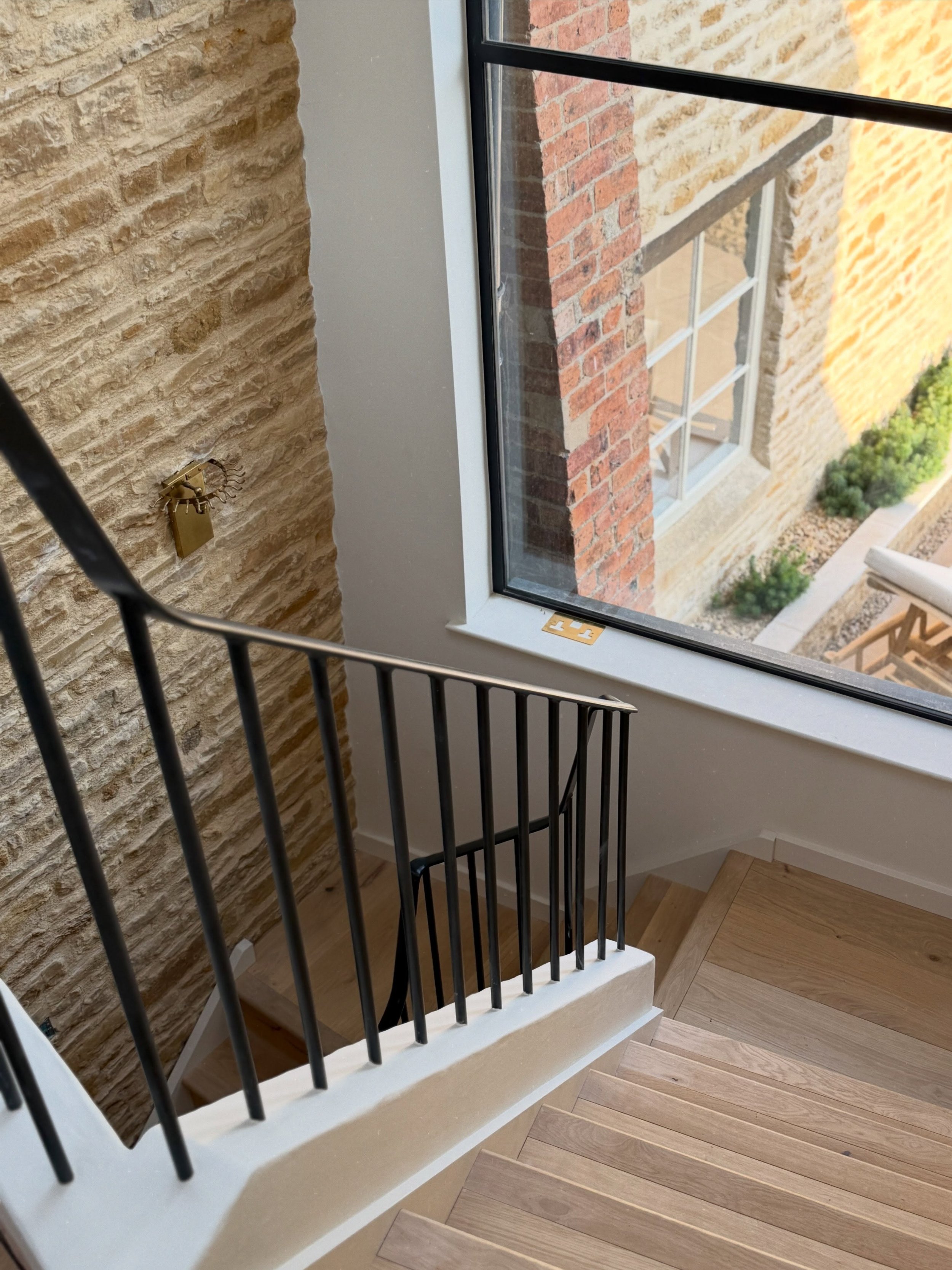 One of our favourite staircases we&rsquo;ve designed.

Warm oak, plaster and black steel, all working alongside the existing exposed stone. Simple, considered details that came together perfectly for our client&rsquo;s home.

Architect - @sk_architec