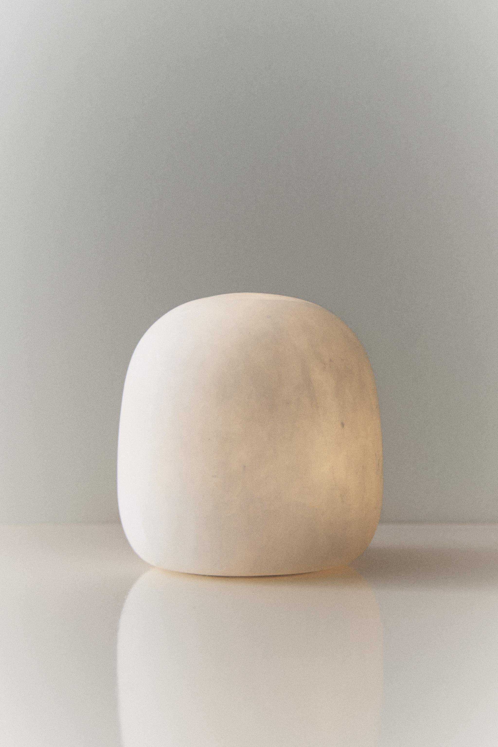 Semi-oval alabaster table lamp