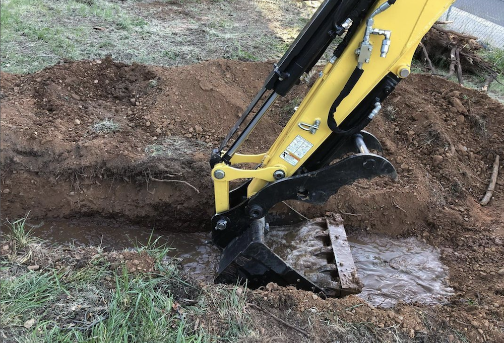 drainage issue septic repair backed up redding excavation contractor.png