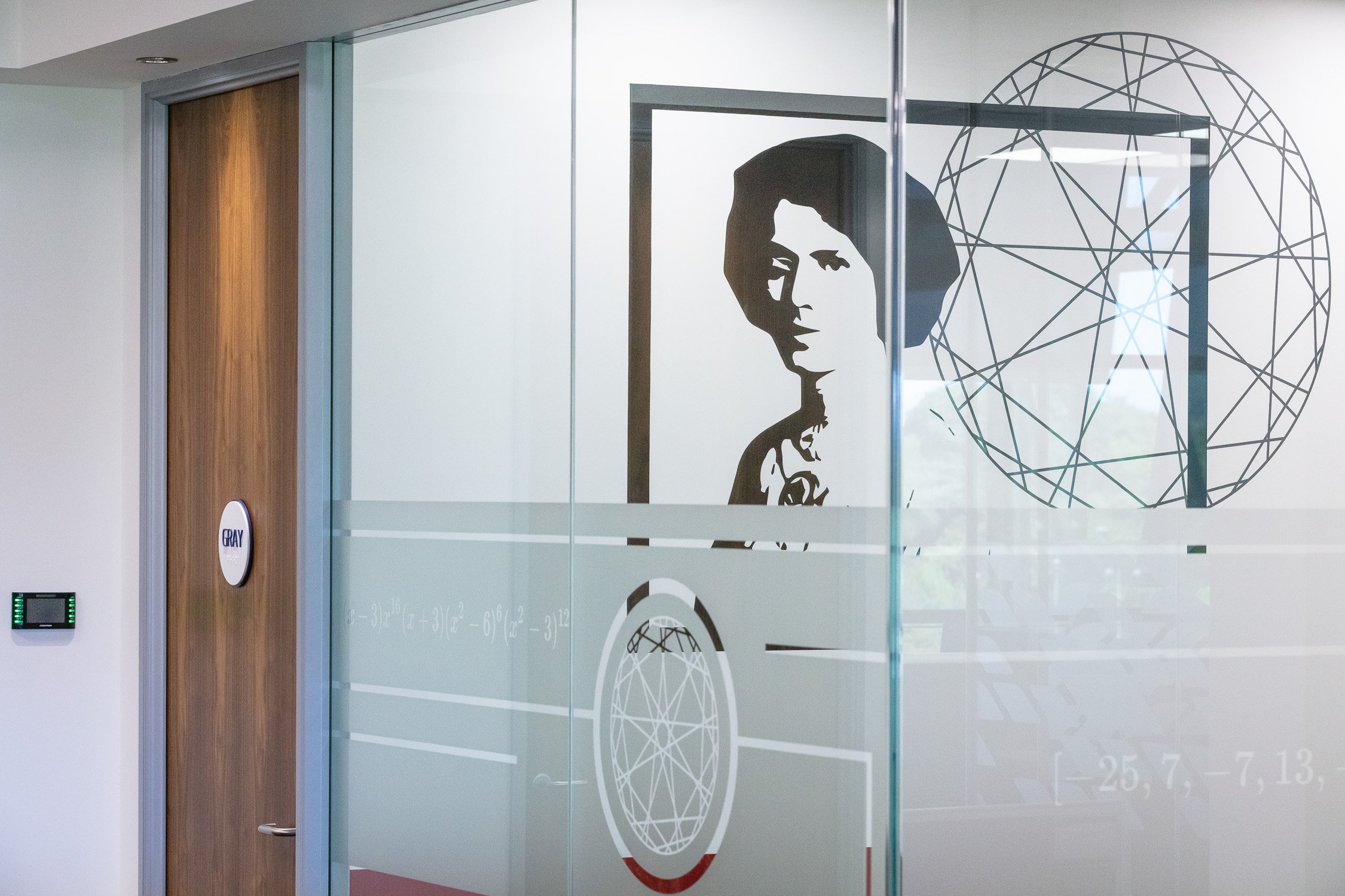 Bespoke glass partitioning and wall graphic design.jpg