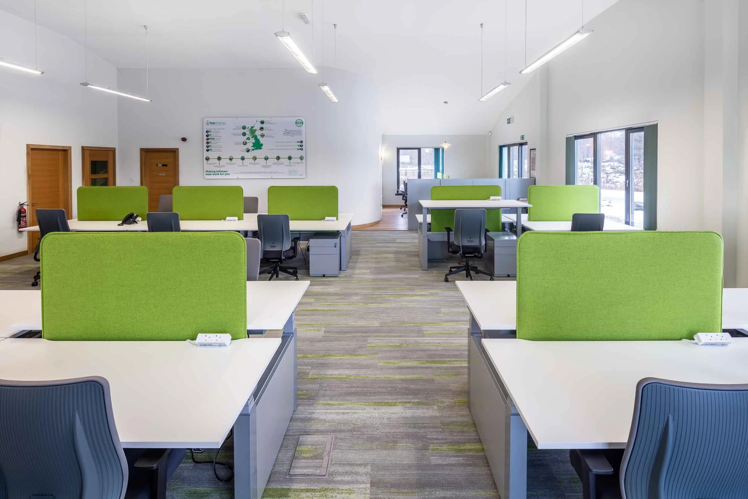 Sit stand desking and seating for AMP Clean Energy — Amos Beech