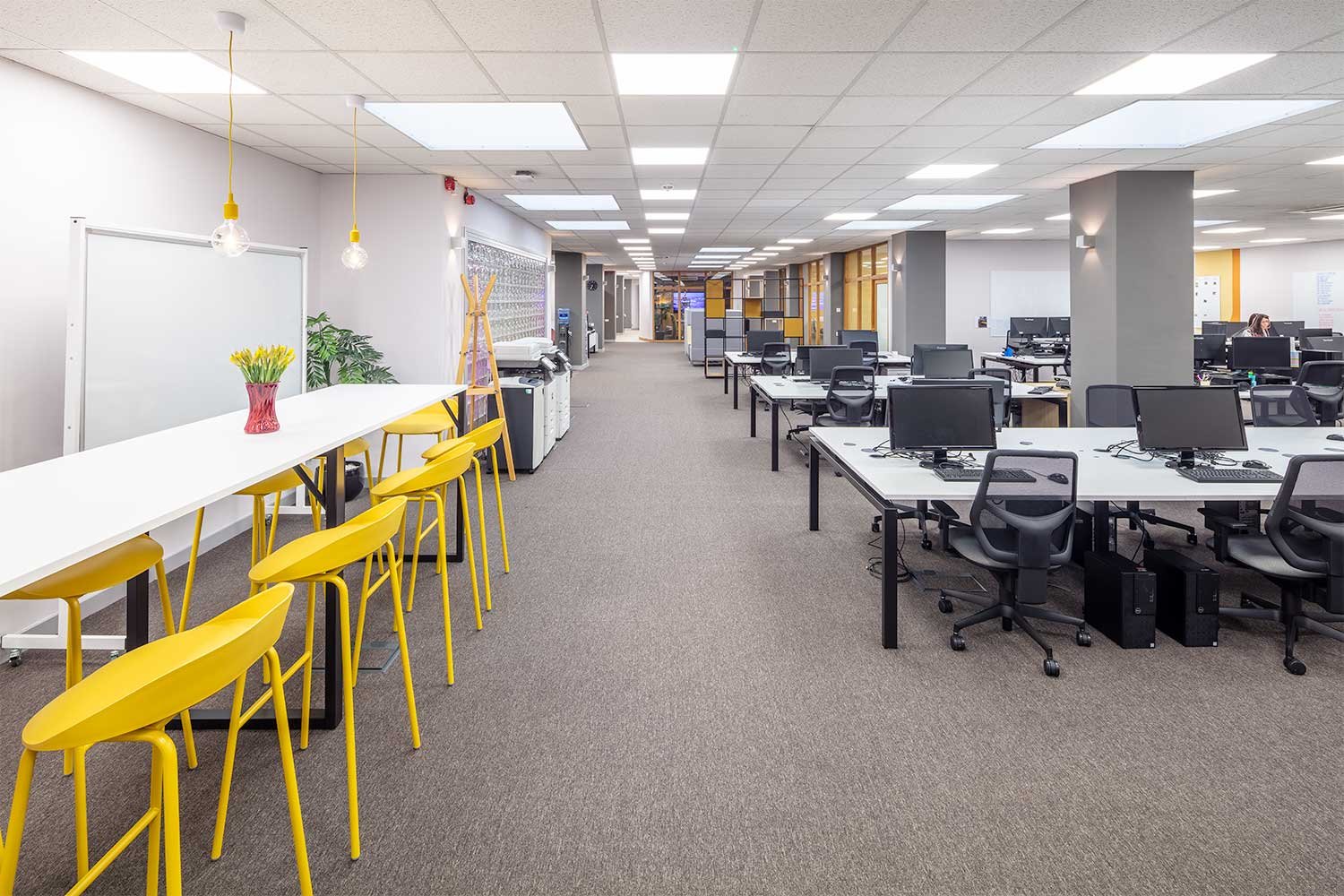 office breakout and collaboration space with white boards