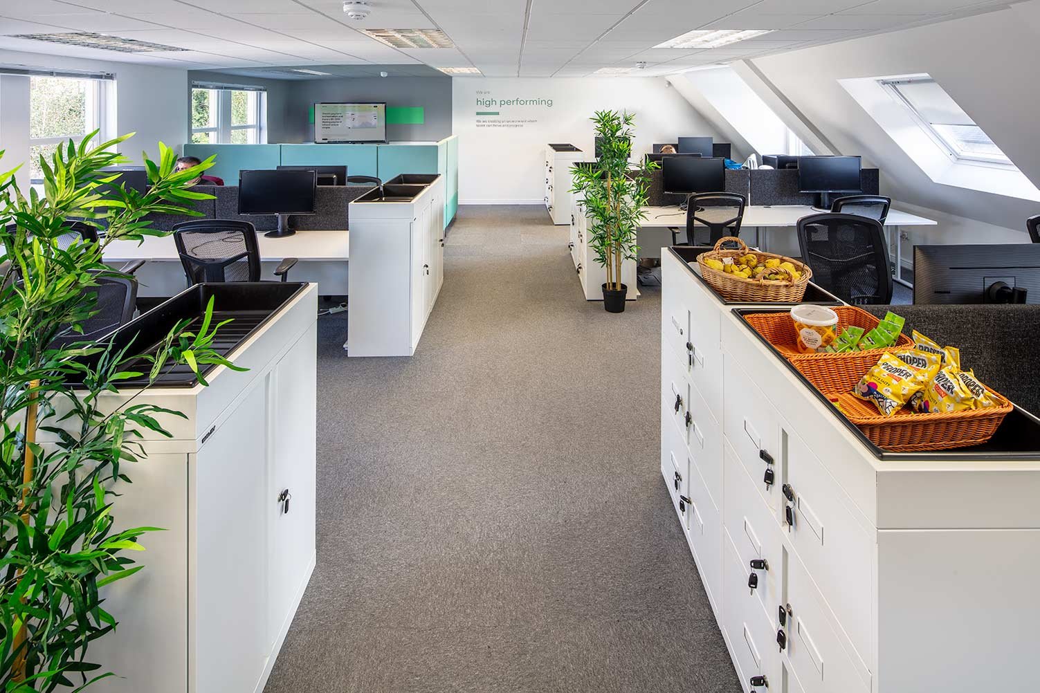 open plan office with presentation area for team discussions