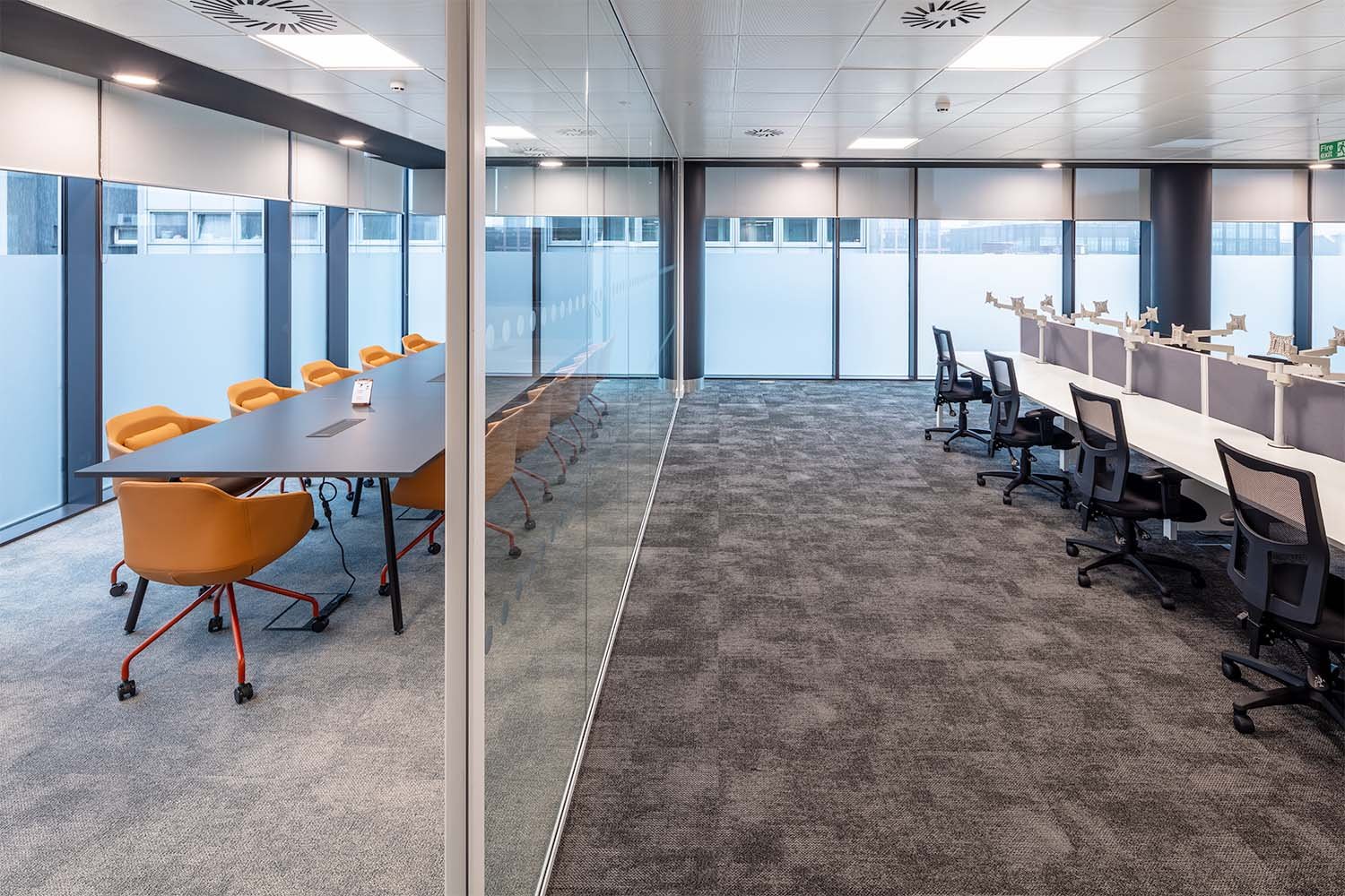 Glass partitioning separating meeting room