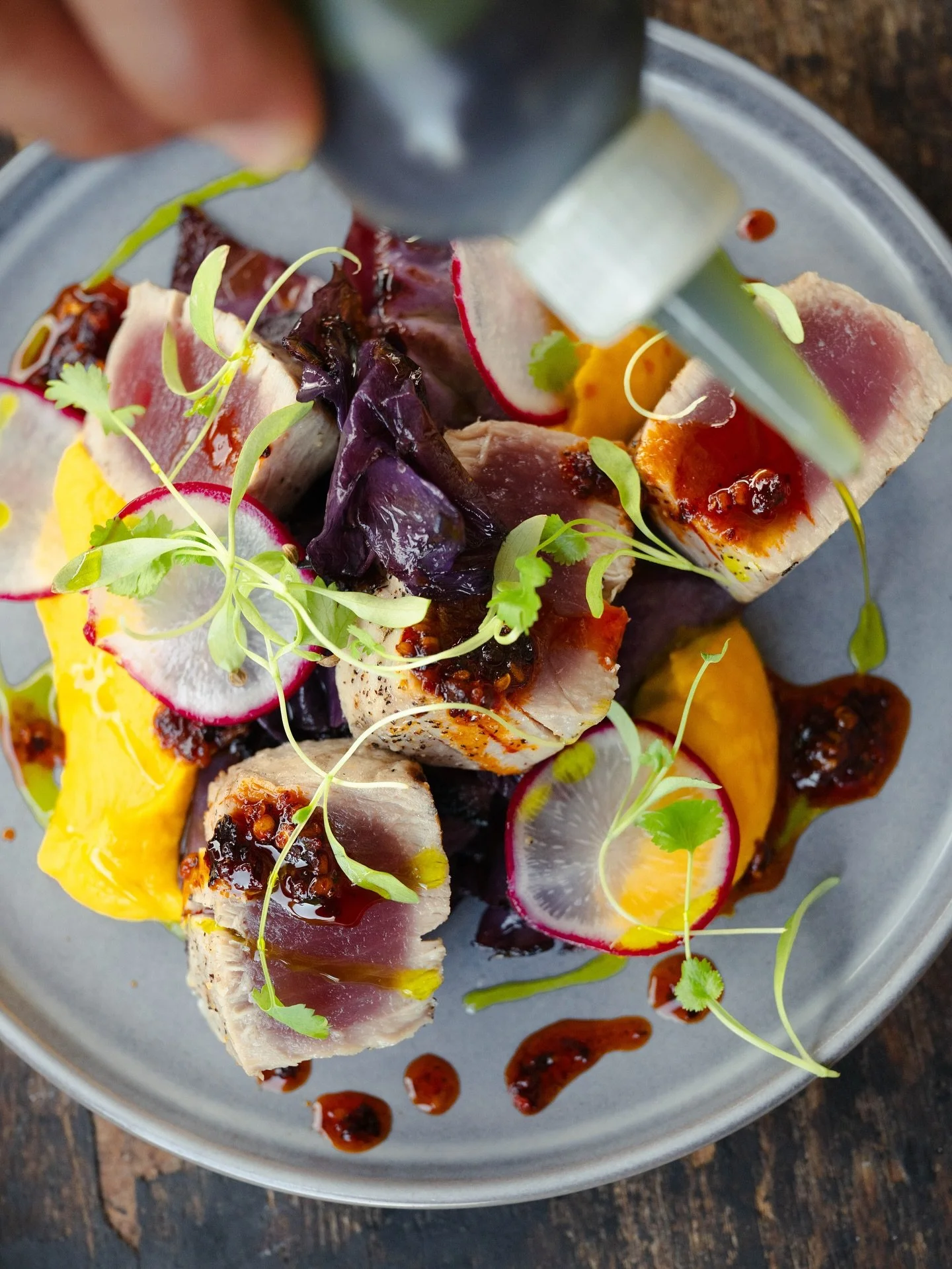 From the Fire: 🔥 Tuna with ginger carrot mousse, braised cabbage &amp; black truffle chili crunch 🤌🏻

📸 @carlinsvision 

#damnthatsdelish #freshcatch #fromthefire #fromfarmtotable #farmtotablenj #njcaterer #barnegatnj #chefpablotoxqui #hautefeast