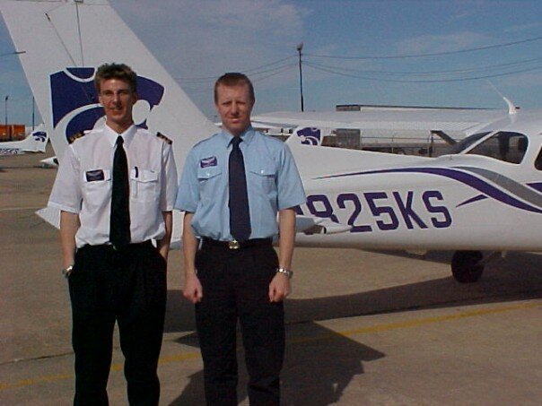 Chris Reynolds (right) after first solo flight
