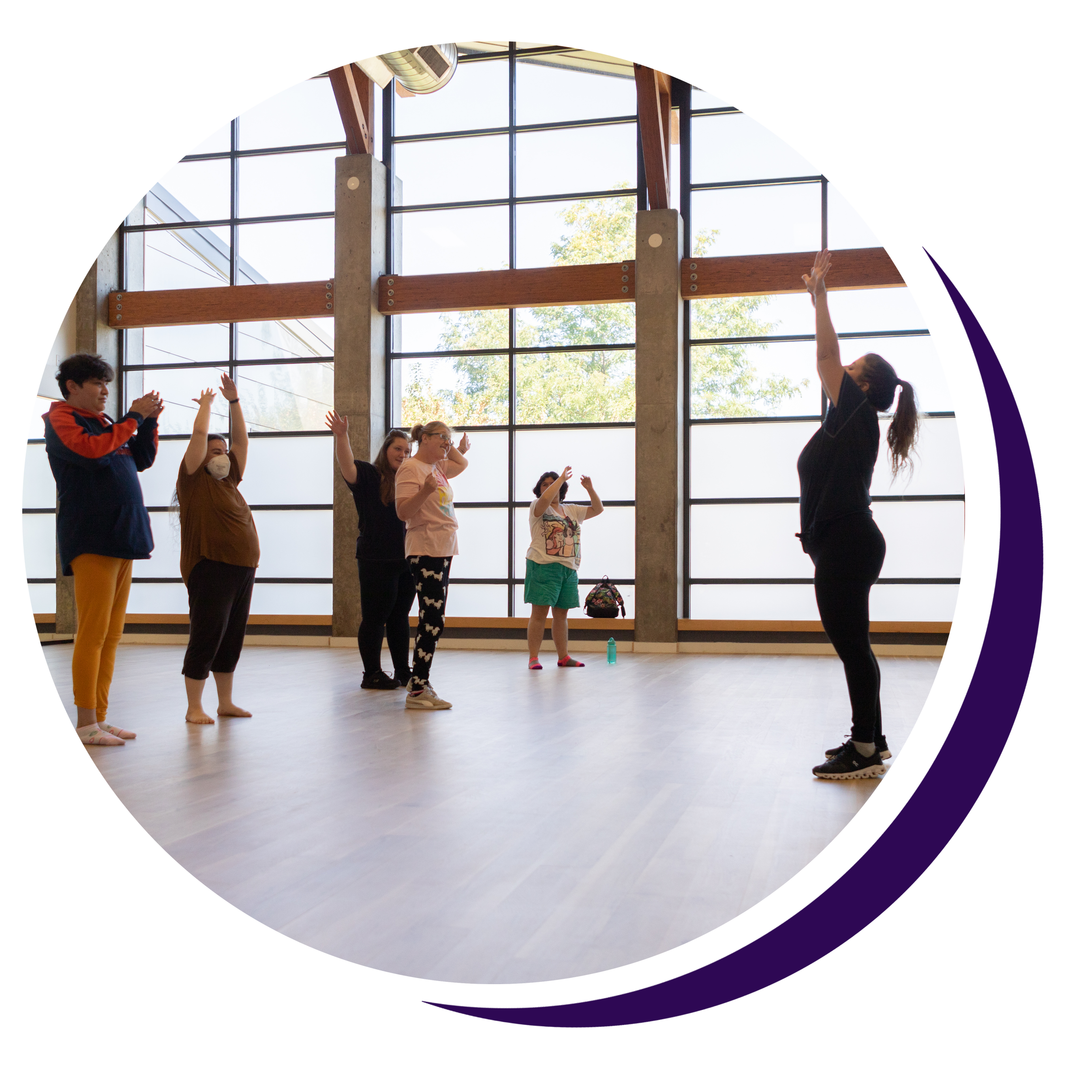 Respite group members participating in a Feel the Beat Dance Class warm up at Charles Whitlock Recreation Center in Lakewood