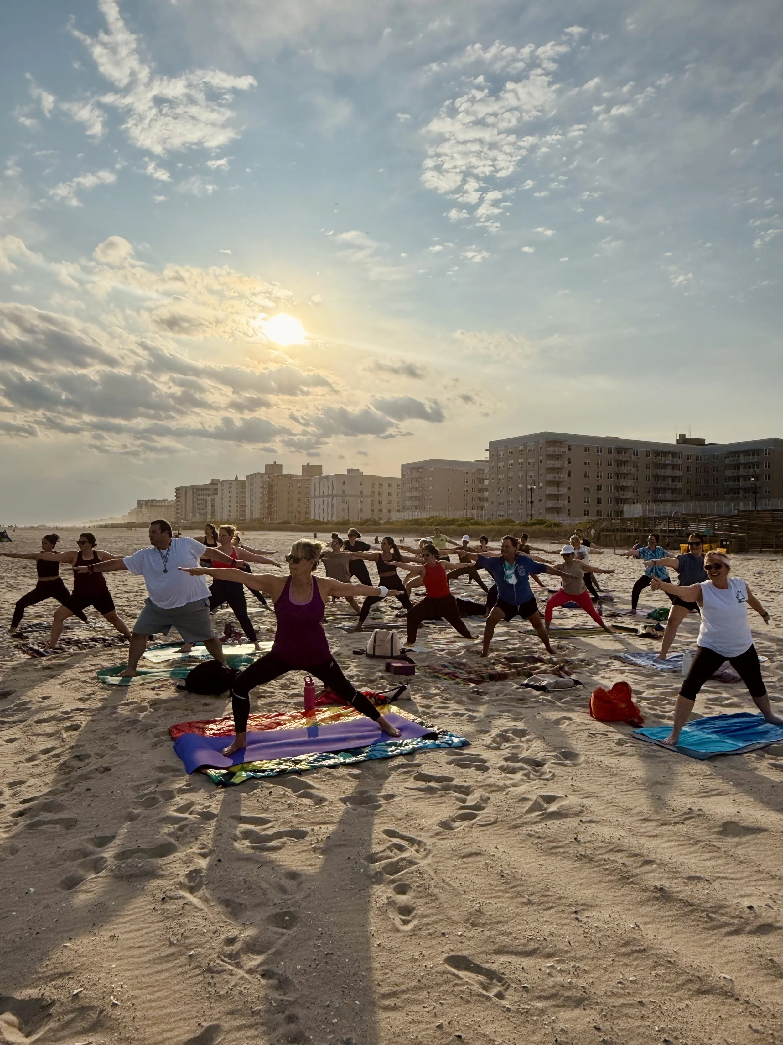 A beach yoga class with Vira Yoga in Long Beach, NY