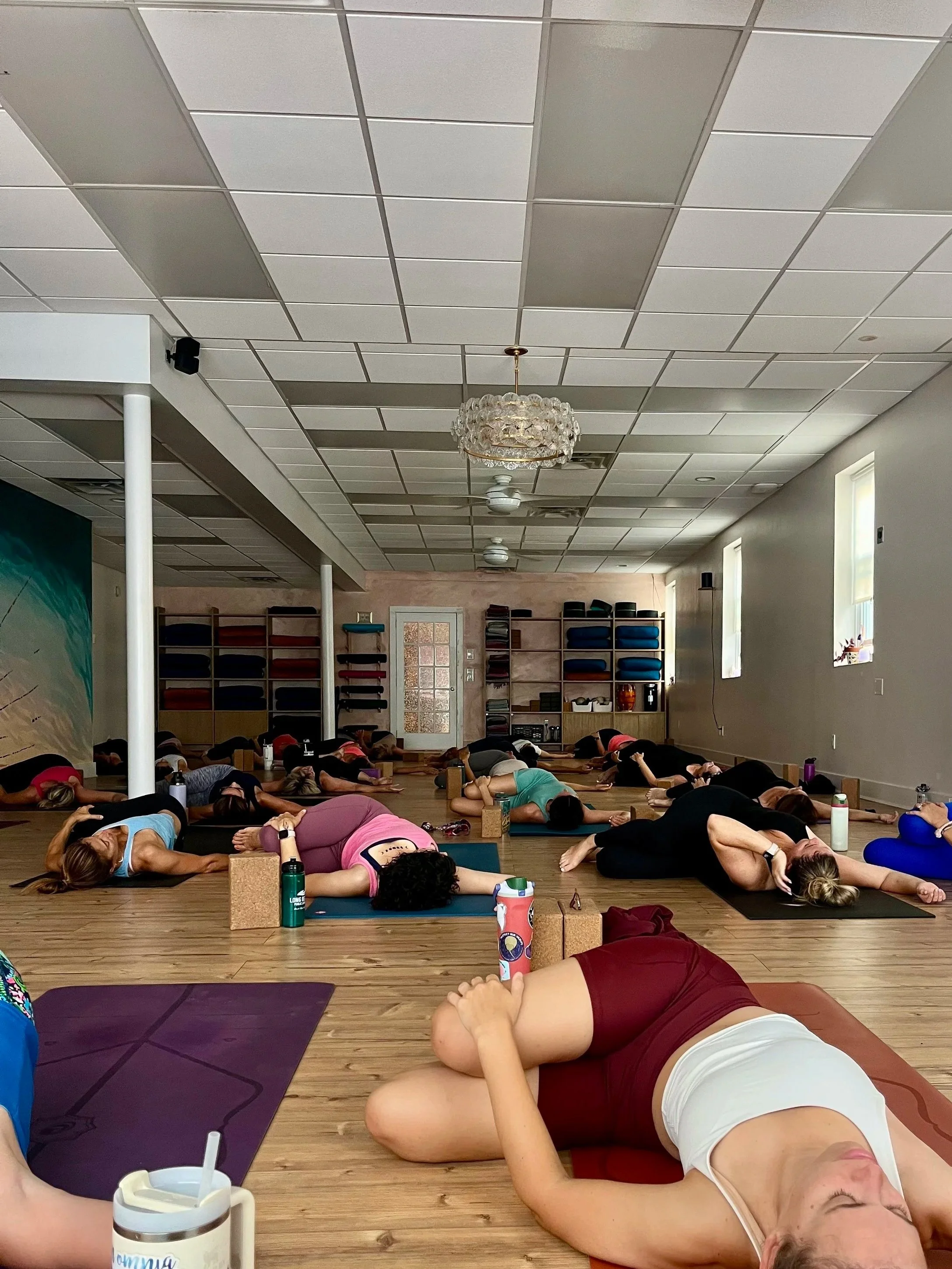 Inside image of what goes on at Vira Yoga in Long Beach NY