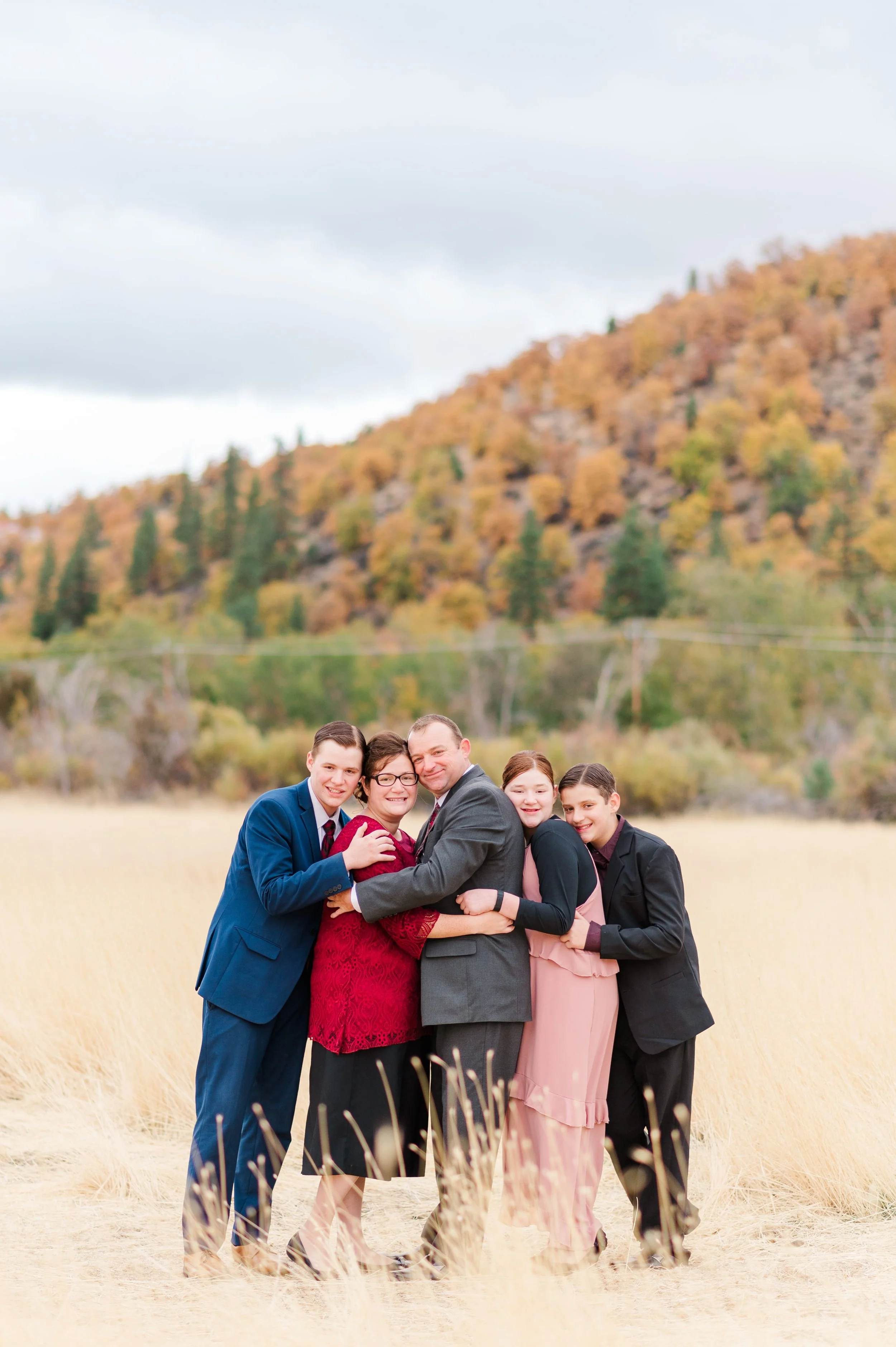 apostolic family leaning on each other at susanville ranch park