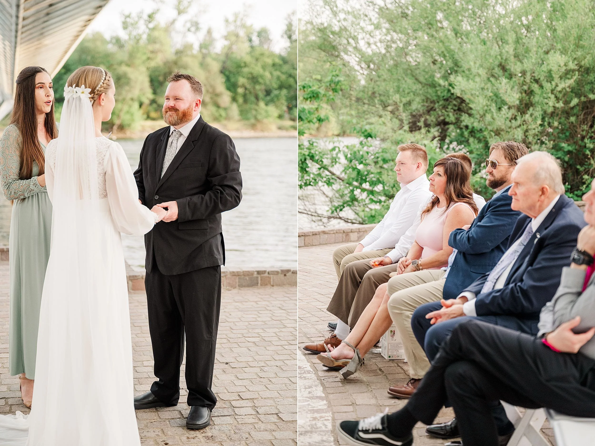 Bride and groom exchange vows beside a river, officiated by a woman. Guests sit nearby in a tranquil outdoor setting, under a large bridge.
