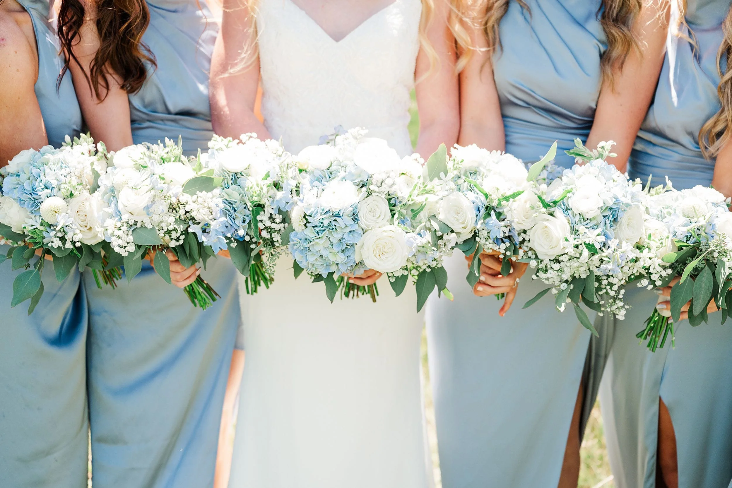 Blue and White bridal bouquets for Bride and Bridesmaids.