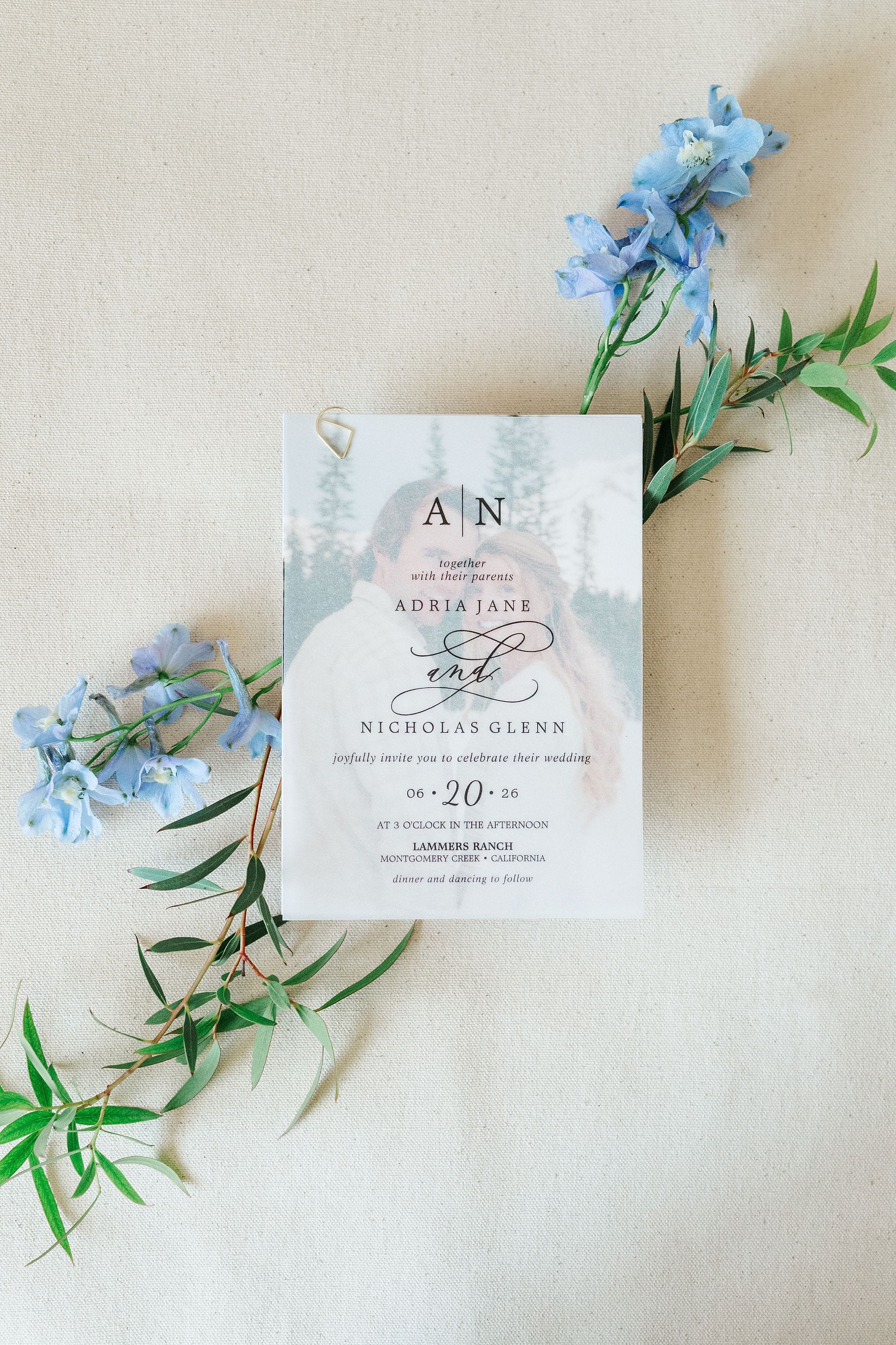 Blue floral wedding invitation suite for Adria and Nick’s mountain ranch wedding.