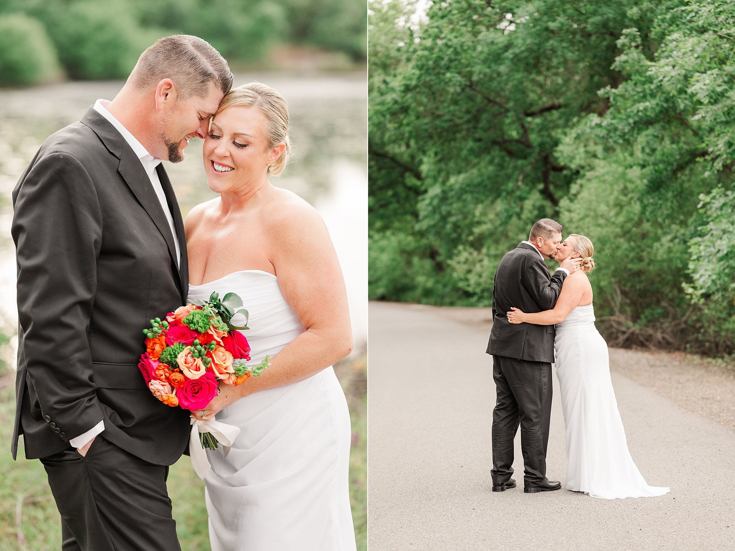 A bride in a white dress and a groom in a black suit share a tender moment outdoors. She holds a colorful bouquet, both smiling joyfully under green trees.