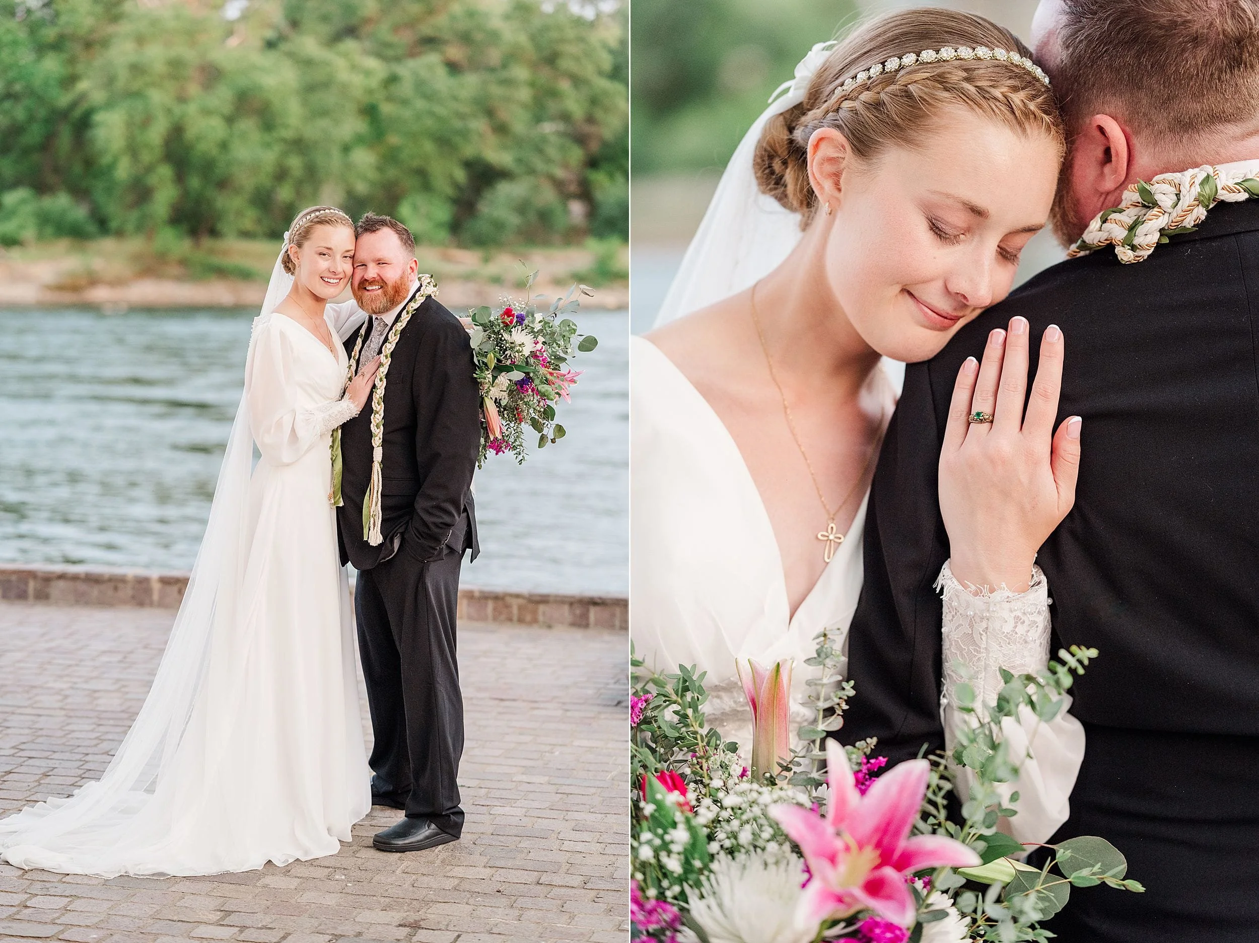 A bride in a white gown and a groom in a black suit embrace by a riverside. She holds a bouquet with pink lilies, conveying love and serenity.