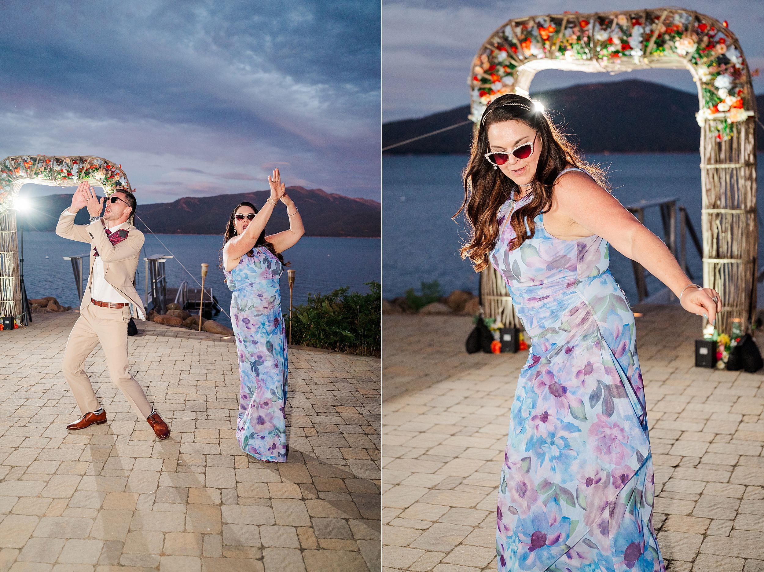 Mother and son dance by a lakeside floral arch at sunset; one poses in sunglasses and a pastel dress, while the other claps joyfully.