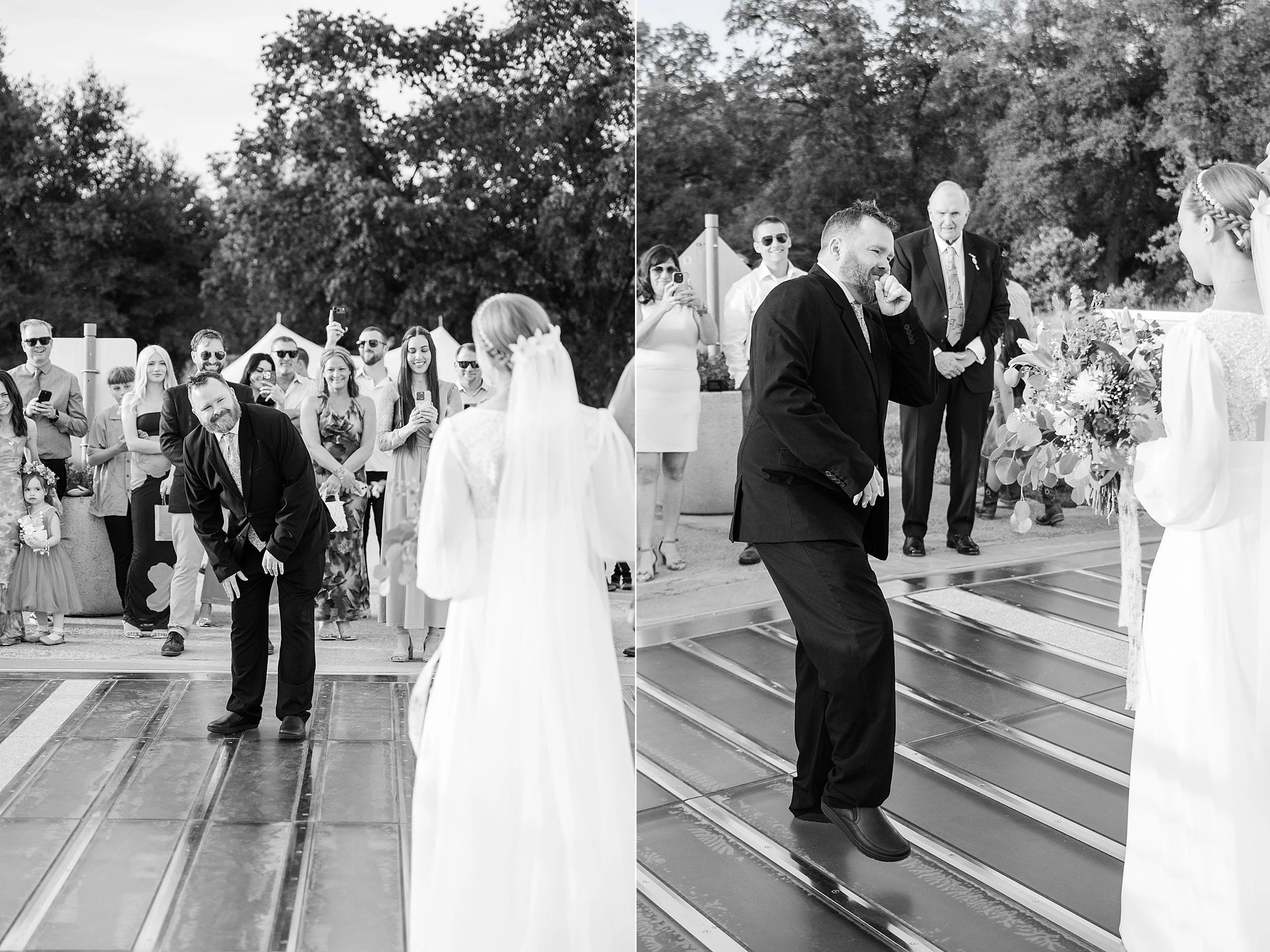 A bride in a white dress faces a man in a suit during a wedding ceremony, surrounded by smiling guests. The atmosphere is joyful and celebratory.
