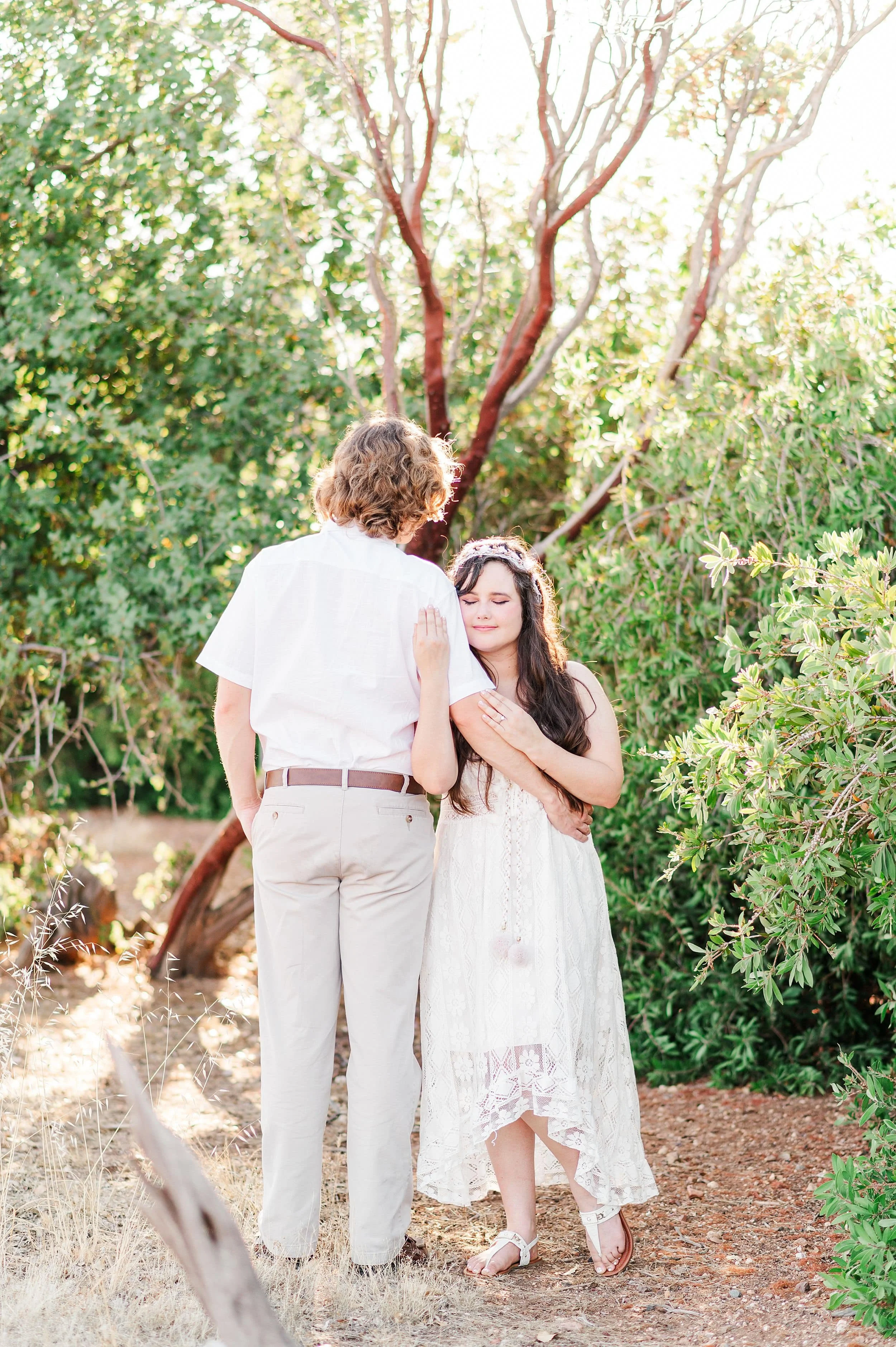 girl leaning on fiance's shoulder
