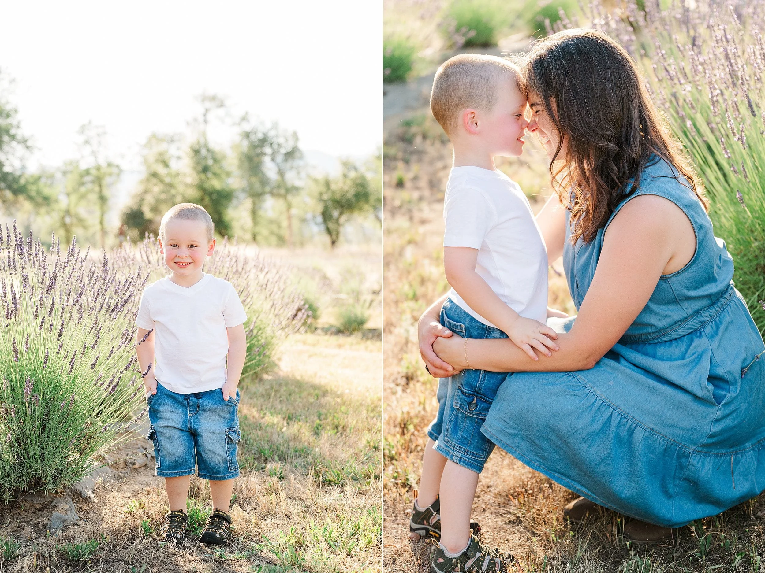 A young boy in a white t-shirt and denim shorts stands smiling next to lavender bushes. Beside him, he shares a tender nose-to-nose moment with a woman in a blue dress, both showing affection and joy amidst a sunny, natural setting.