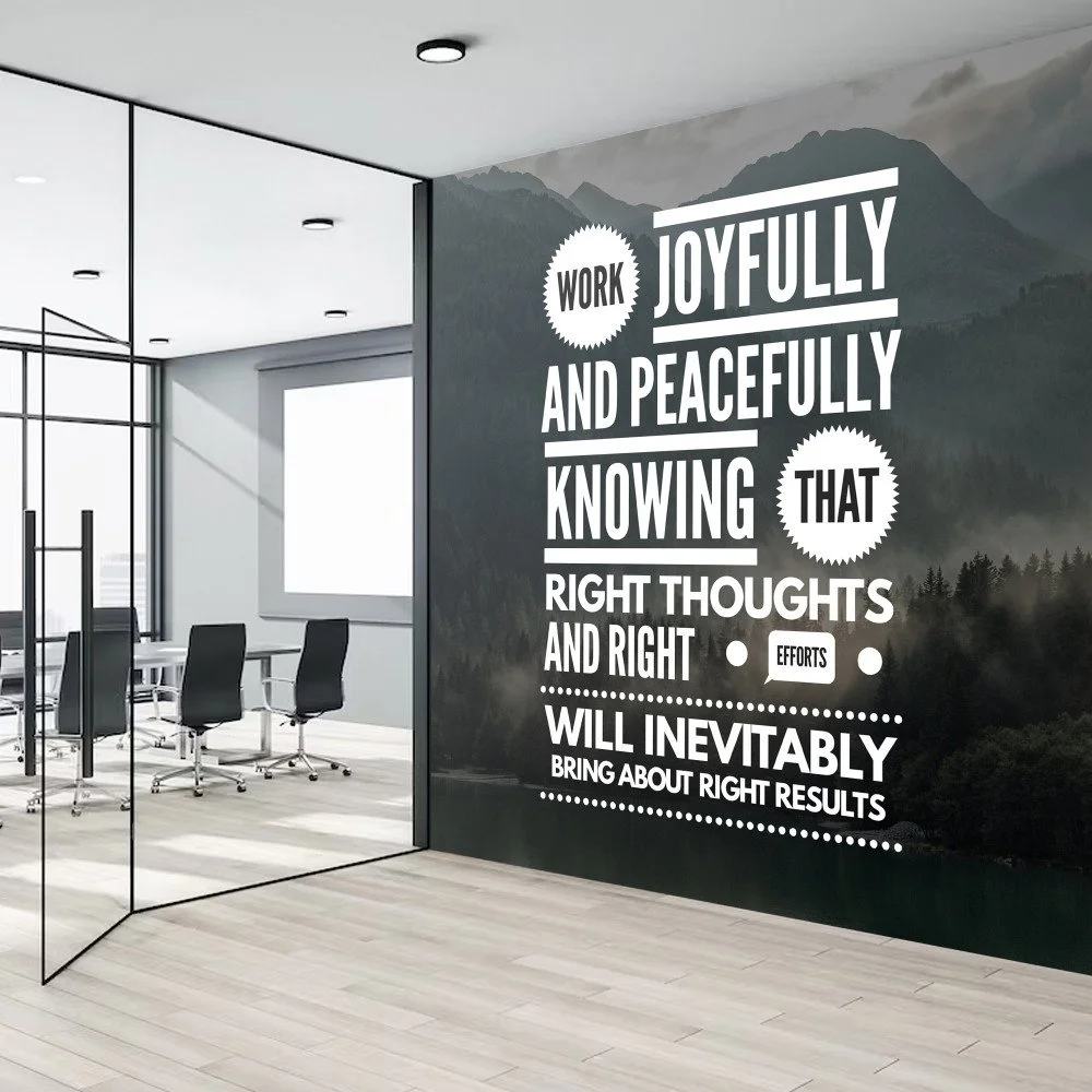 Office meeting room with a glass wall and mountain landscape mural. On the mural, a motivational quote in large white text reads: "Work joyfully and peacefully, and knowing that right thoughts and right efforts will inevitably bring about right results."
