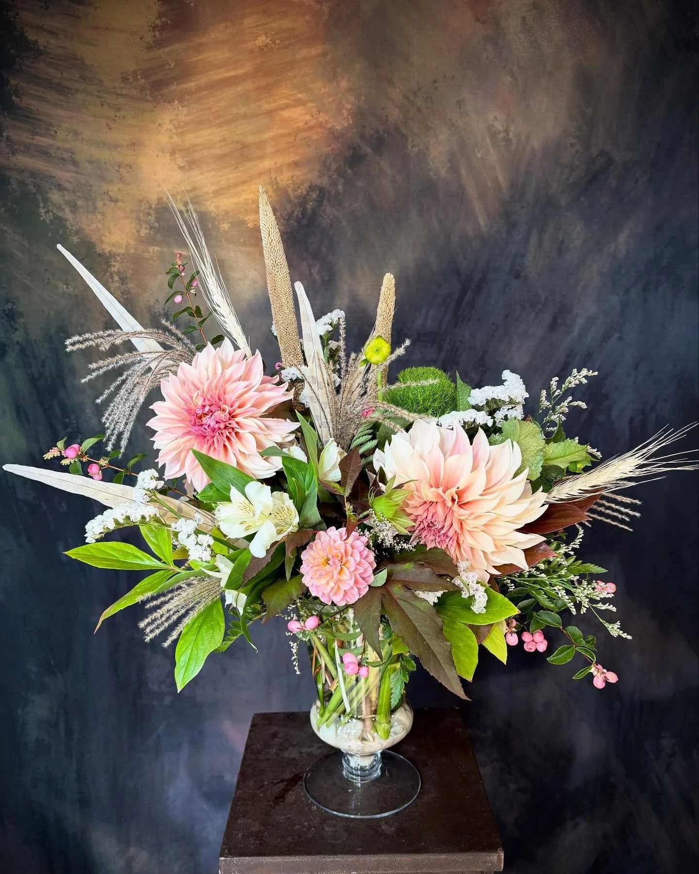 The dahlias in the garden took a beating this weekend but still have a few blooms left in them!