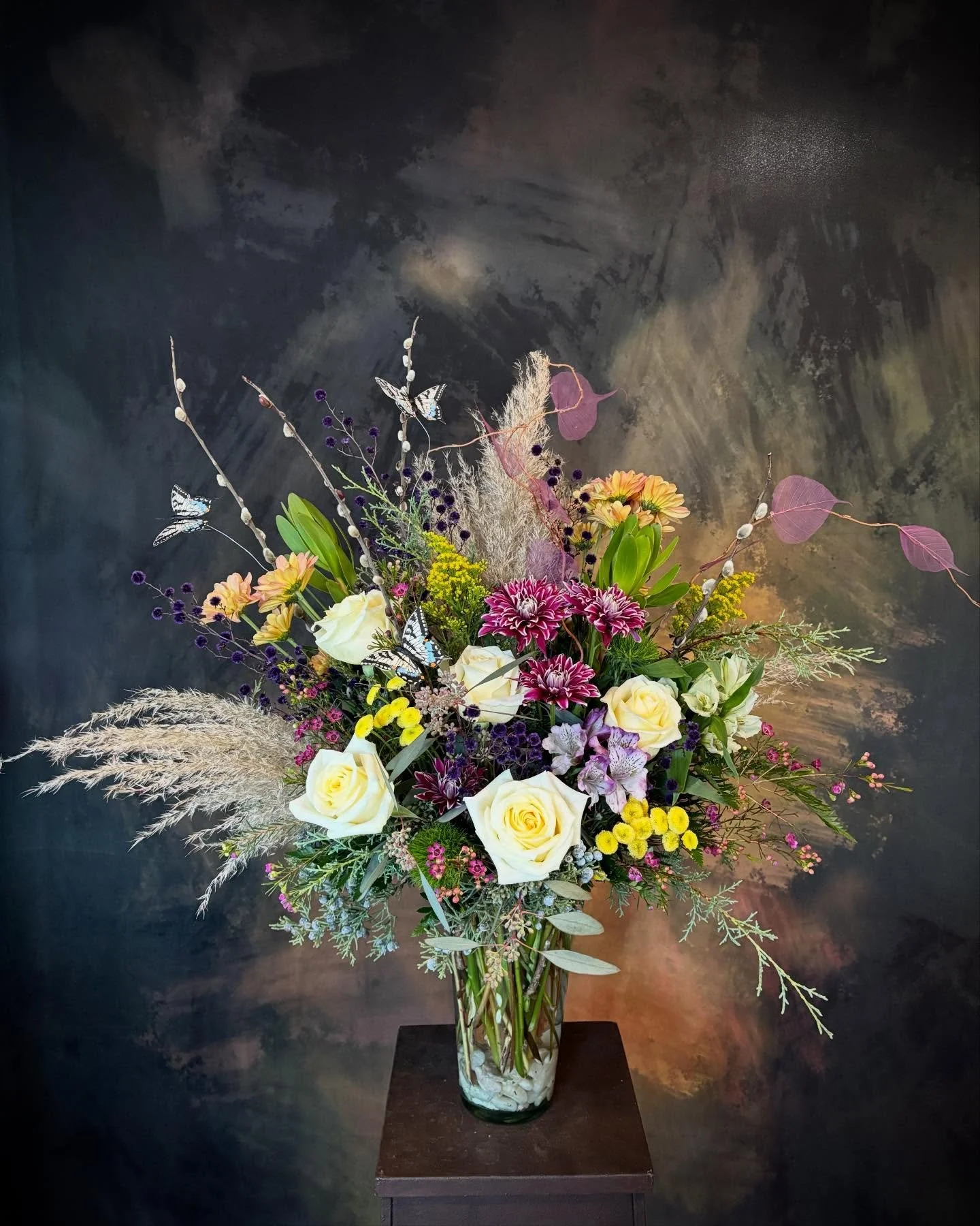 A statement piece for an amazing woman&rsquo;s retirement. 

In larger designs, I focus on creating movement, like a painting, so your eye keeps traveling throughout the arrangement. No two designs are ever the same, each arrangement is a one-of-a-ki