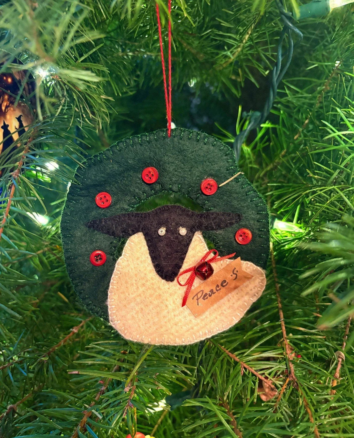 I got this ornament a few years ago because this felt sheep looks a lot like our Serena, airplane ears and all. (Swipe to see Serena) When we got our first trio, Serena was the oldest one as we bought her and her lamb along with one other youngster. 