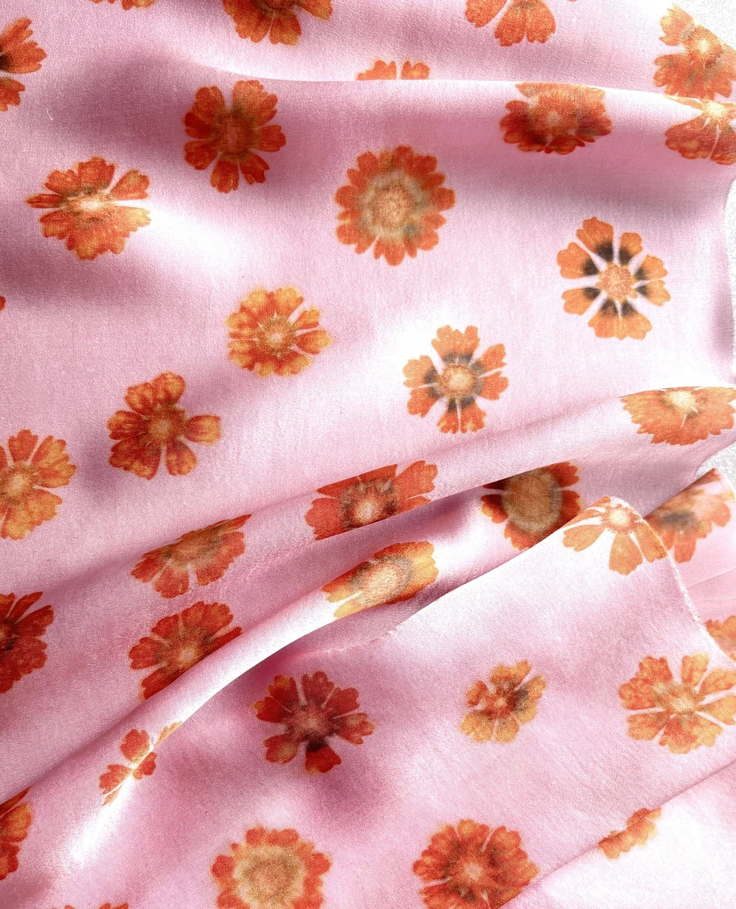 A wholesale customer asked if I could dye pink fabric with flowers so I experimented a little and made this bubblegum pink silk printed with coreopsis flowers I grew and pressed over the summer. I love it so much! Then my customer changed their mind 
