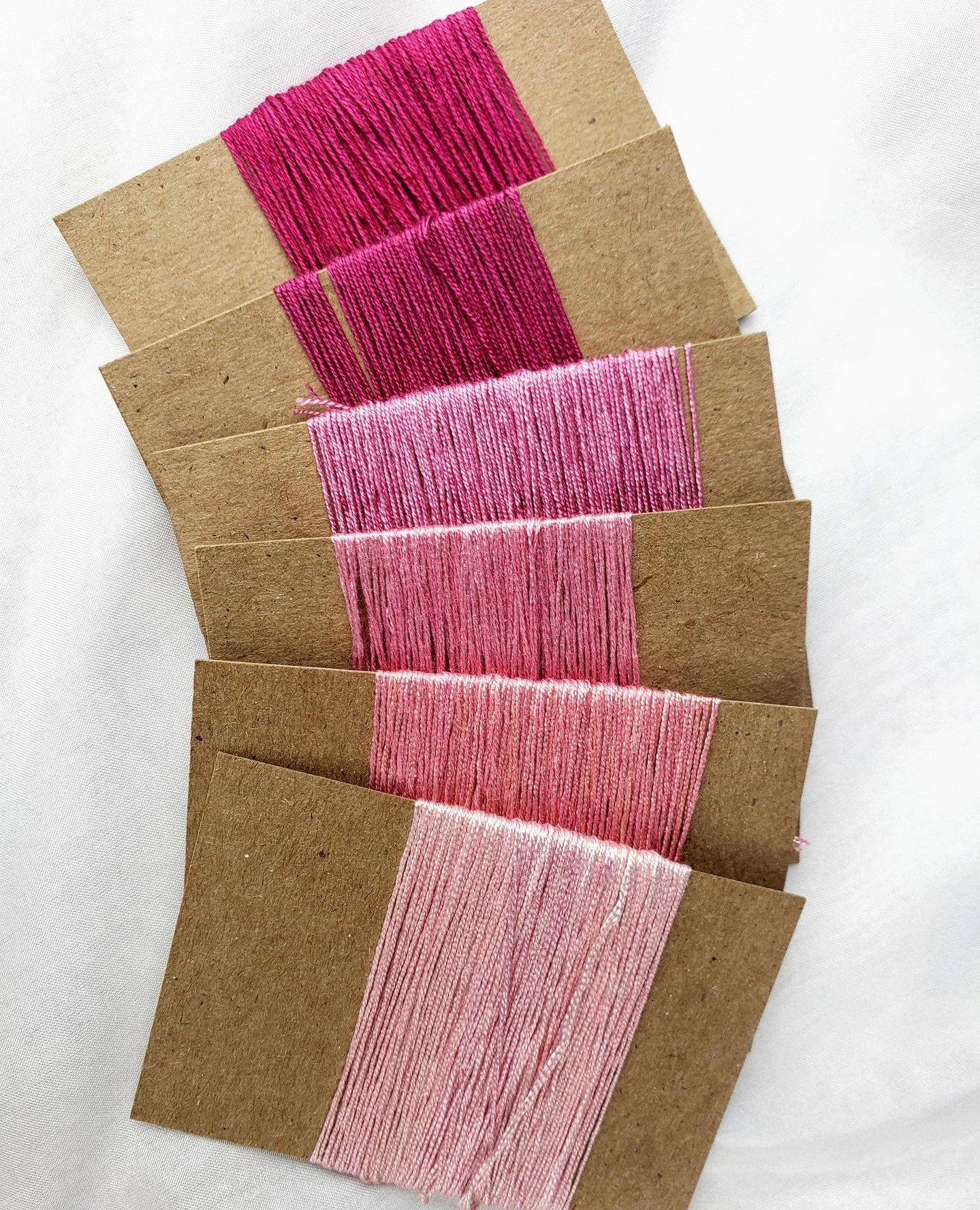 I love the range of shades that be achieved with a single natural dye. These silk threads were all dyed with cochineal, some with stronger dye baths, some in exhaust baths, and some changed a bit by pH differences in the water. Nature provides so man
