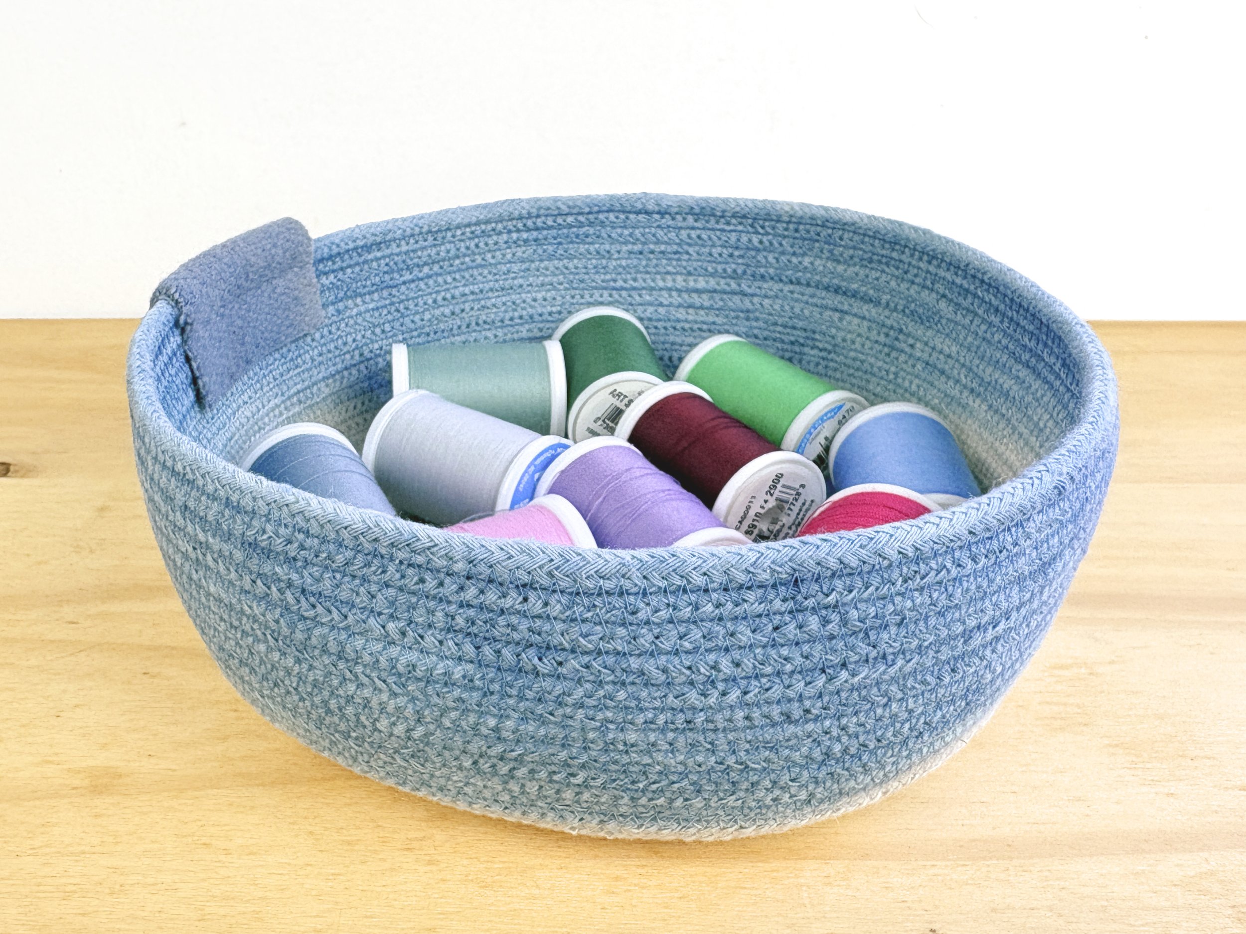 blue curving stripe thread rectangle.jpg