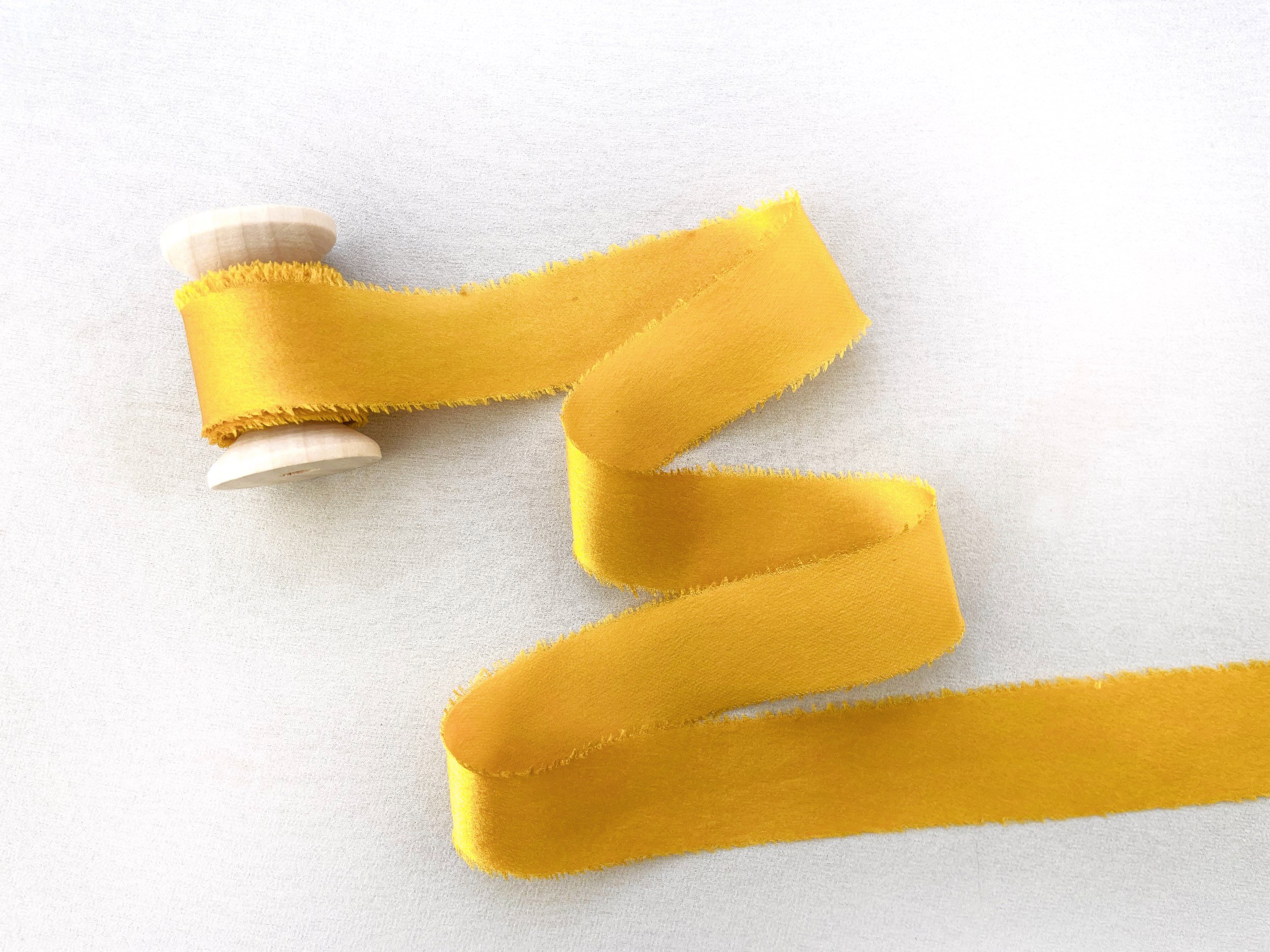 medium marigold swoosh rectangle.jpg