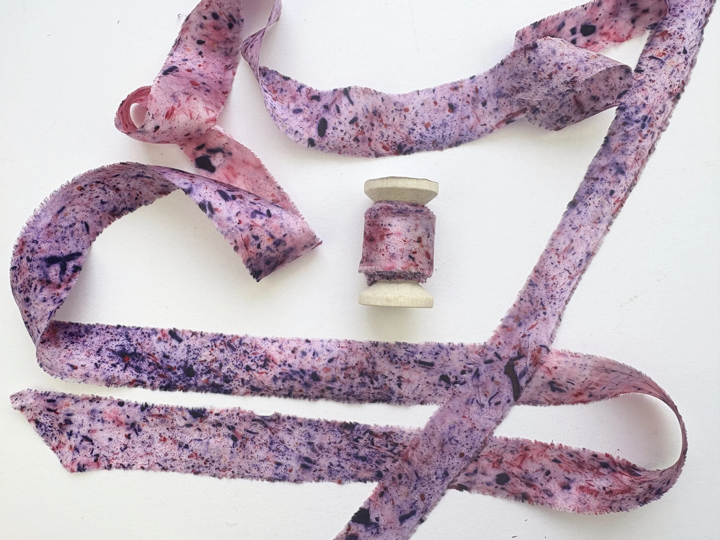purple pink speckles spool rectangle.jpg