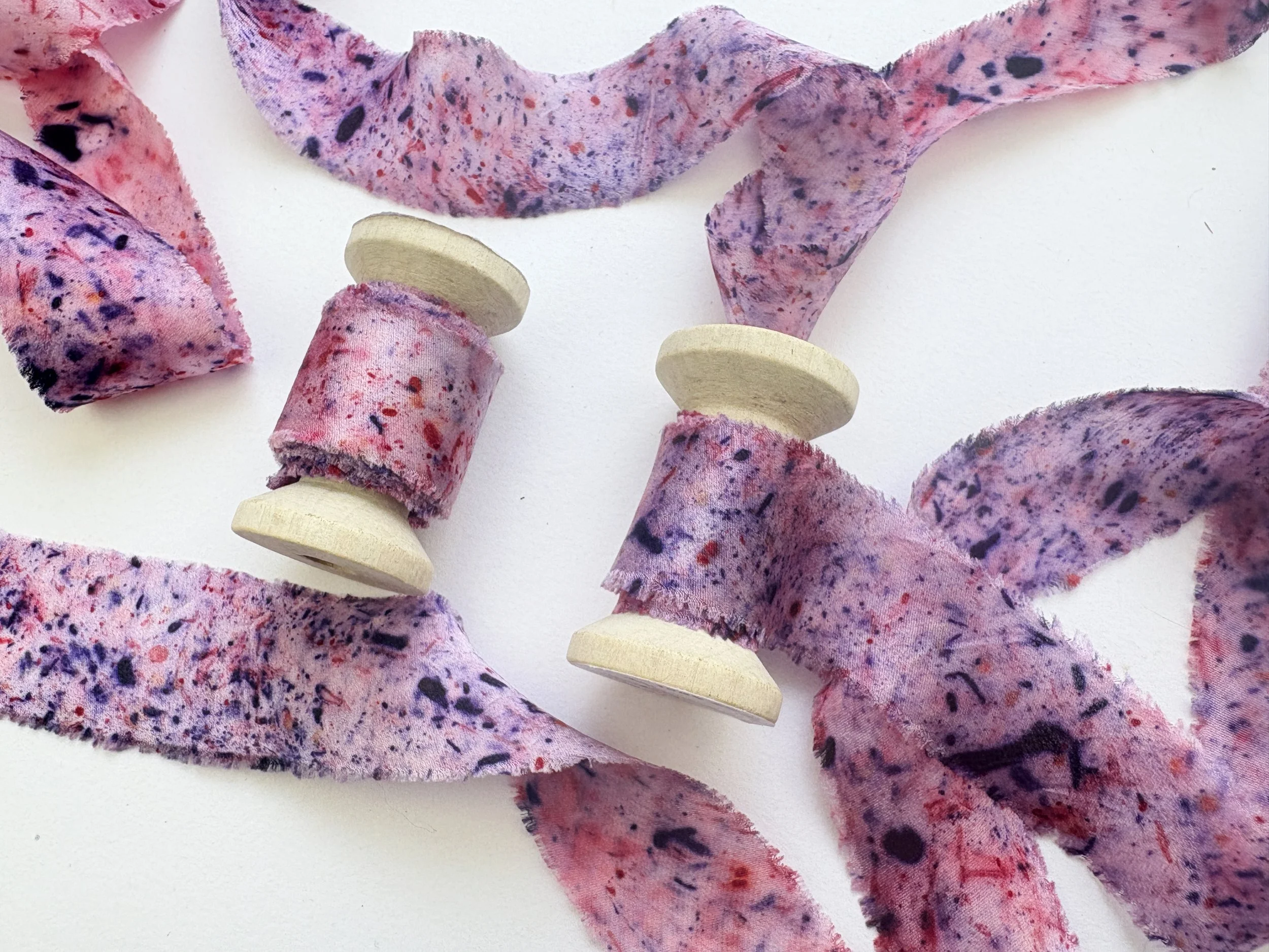 purple pink speckles spools rectangle.jpg