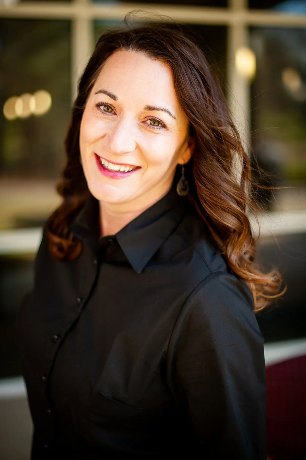 An image of tanya kemp smiling at the camera