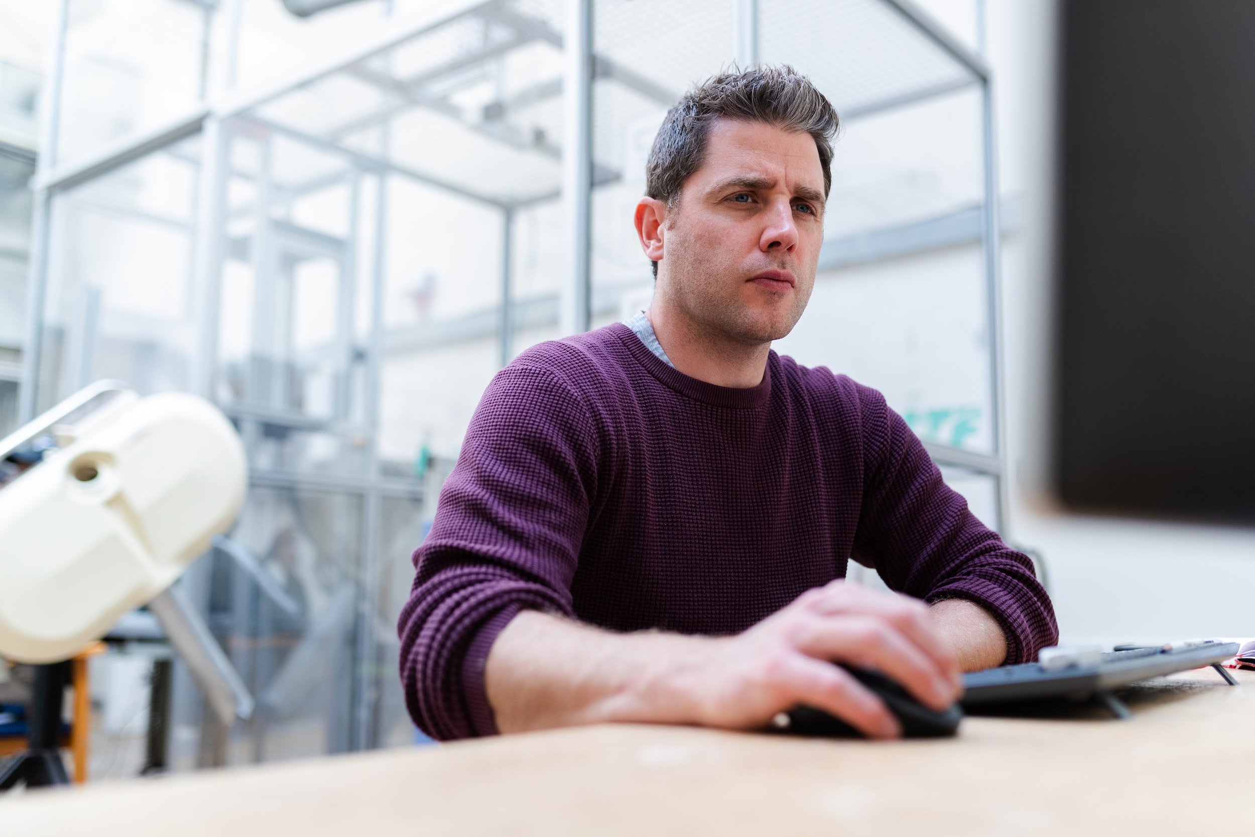 man looking at computer