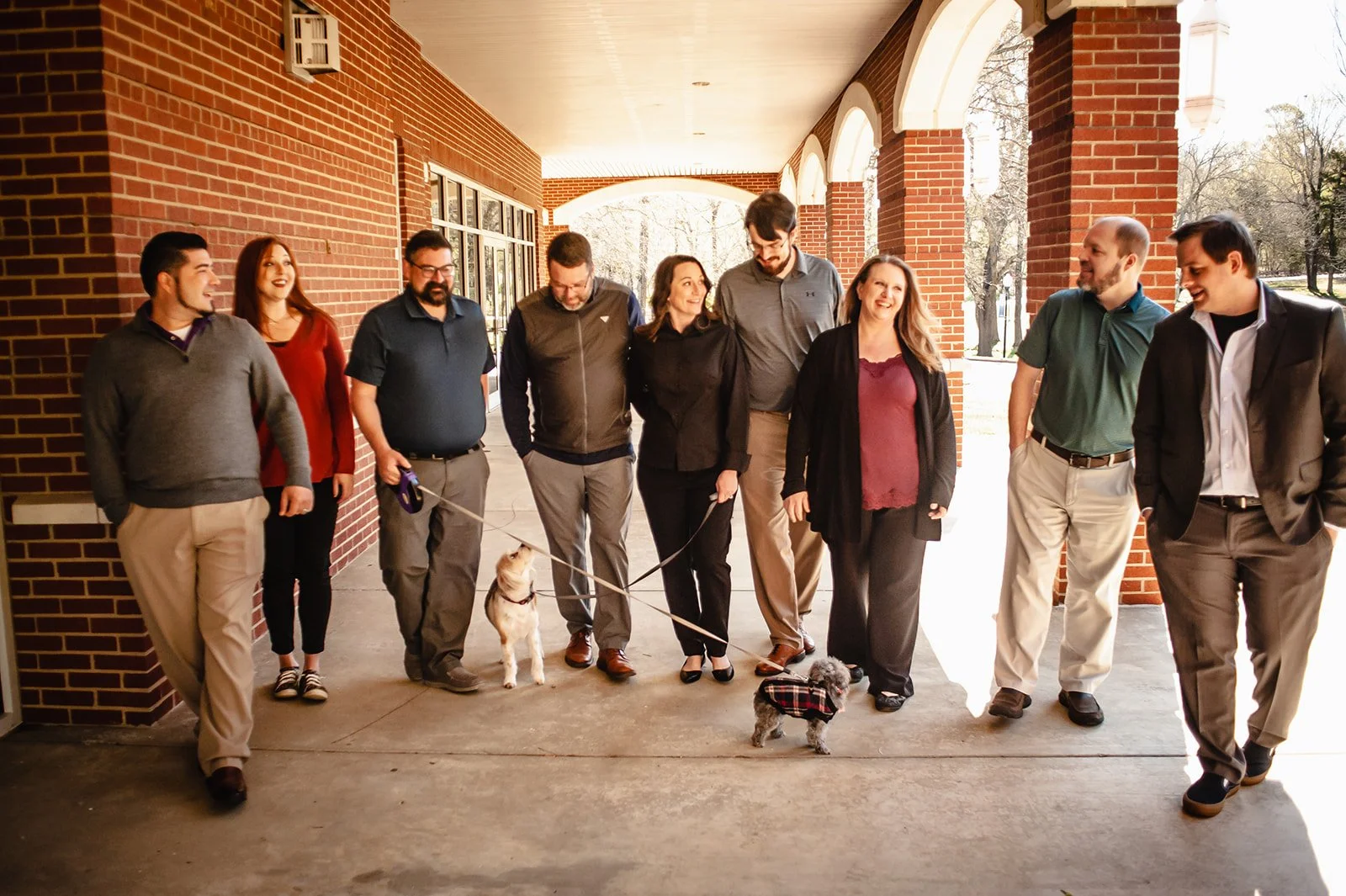 the Ozark team walking their two dogs