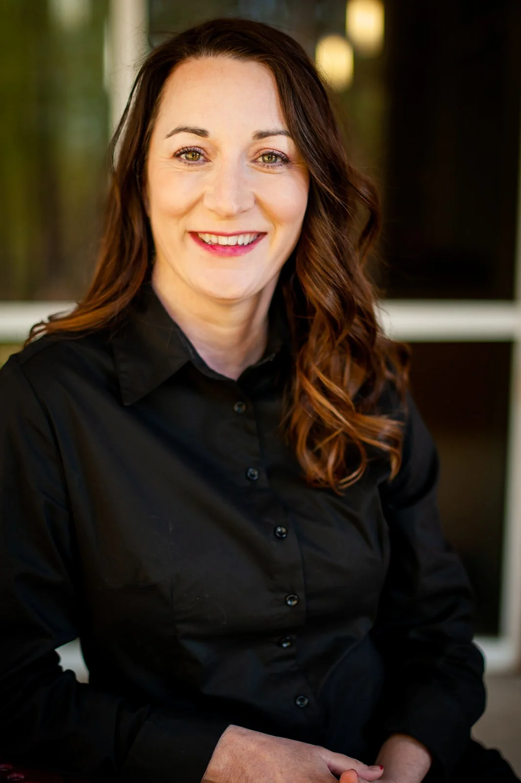 an image of Tanya Kemp smiling at the camera